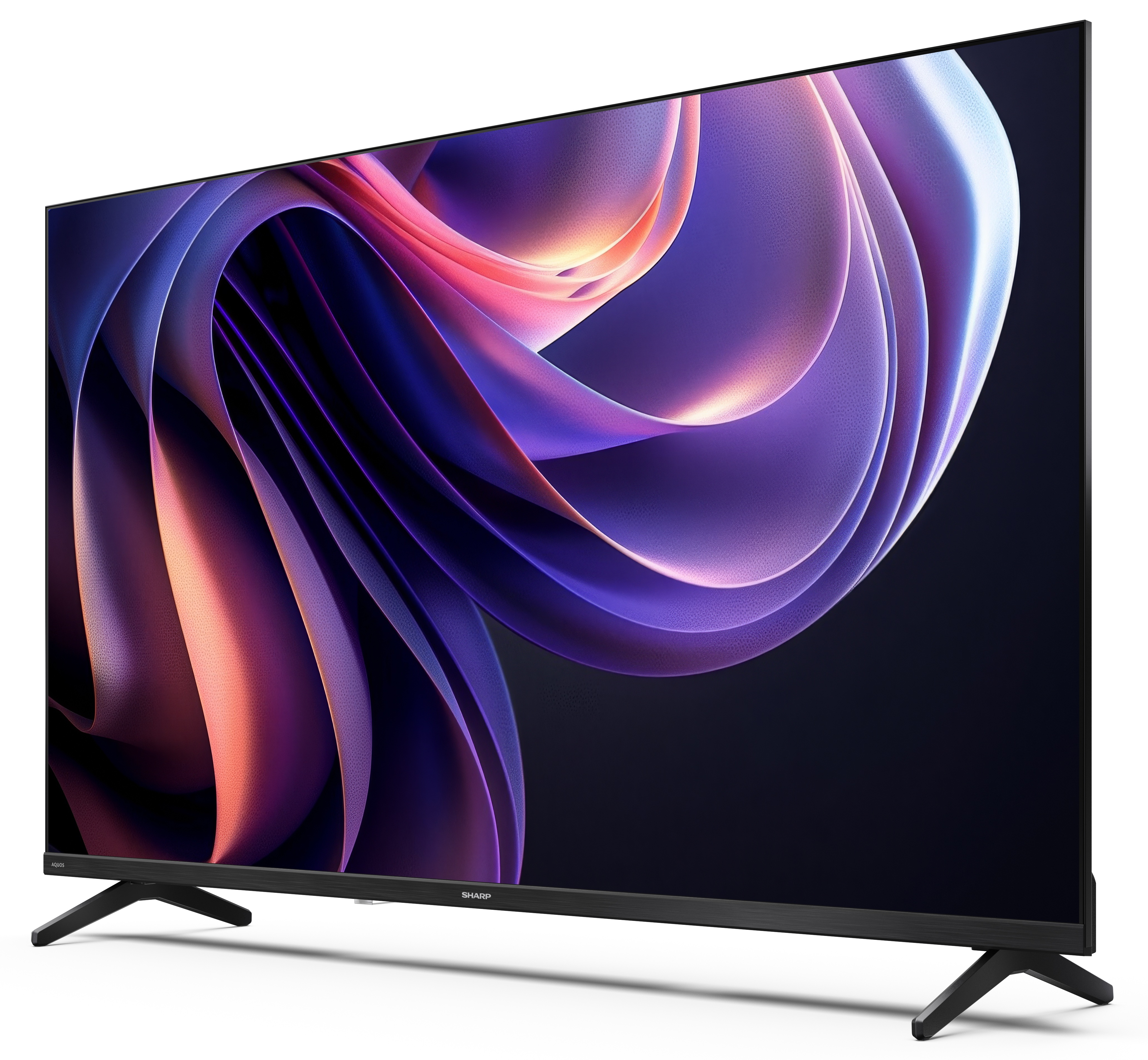 Duży, pochylony telewizor wyświetla wirujący, abstrakcyjny wzór. Telewizor jest czarny z czarnymi nogami i stoi na białej powierzchni.