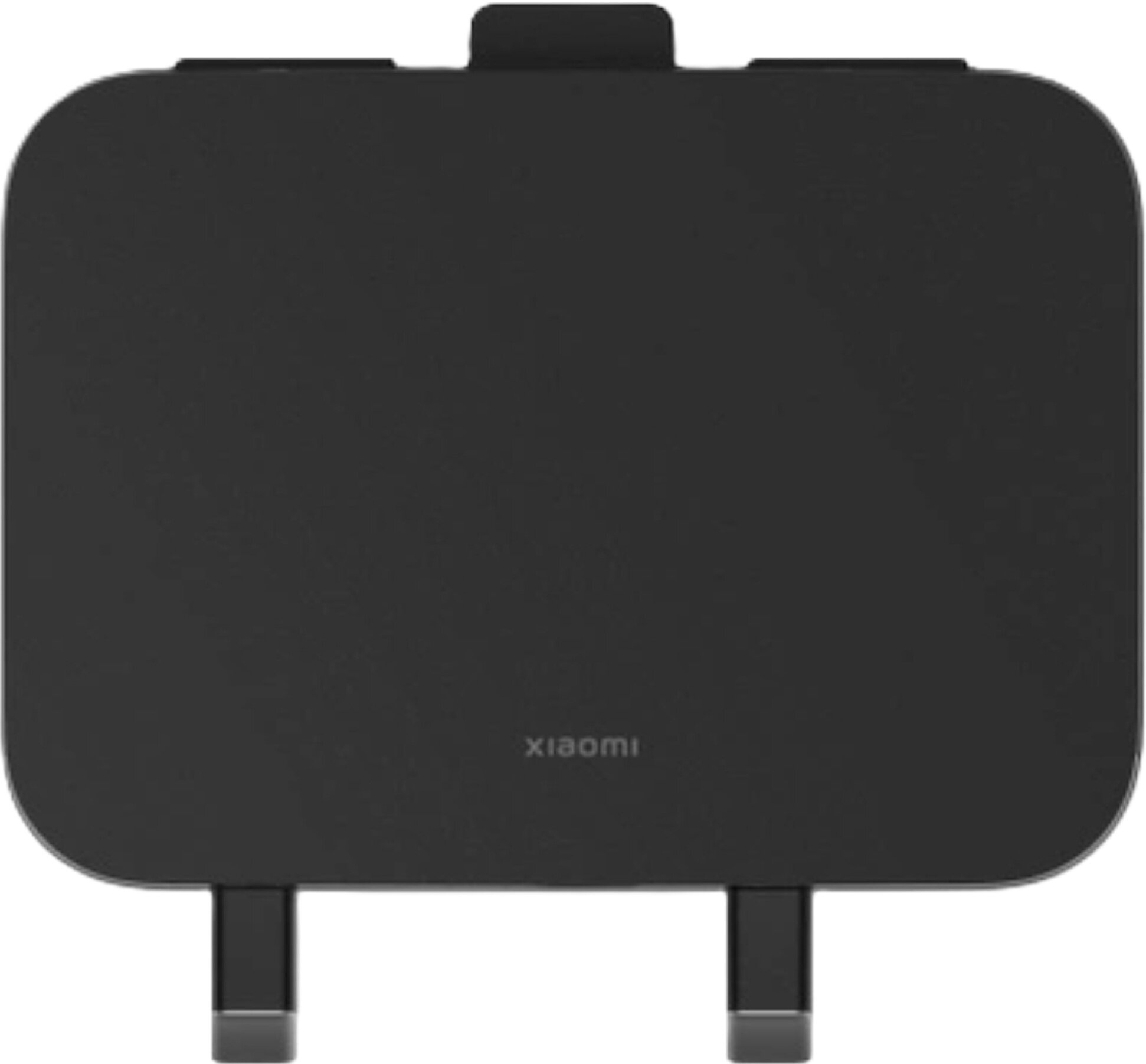 Czarna ładowarka Xiaomi z zaokrąglonymi rogami, uchwytem na górze i dwoma bolcami na dole. Widoczne logo Xiaomi.