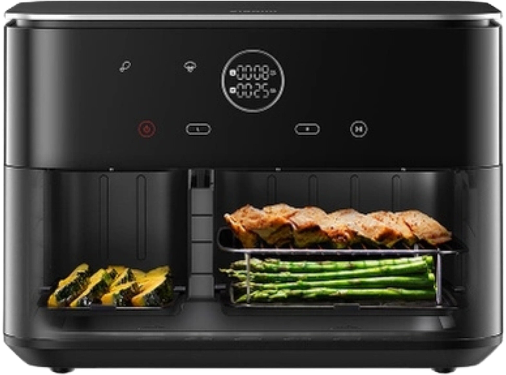 Czarna frytkownica powietrzna z ugotowanym jedzeniem w środku. Widoczne plastry dyni, szparagi i mięso. Wyświetlacz cyfrowy pokazuje czas.