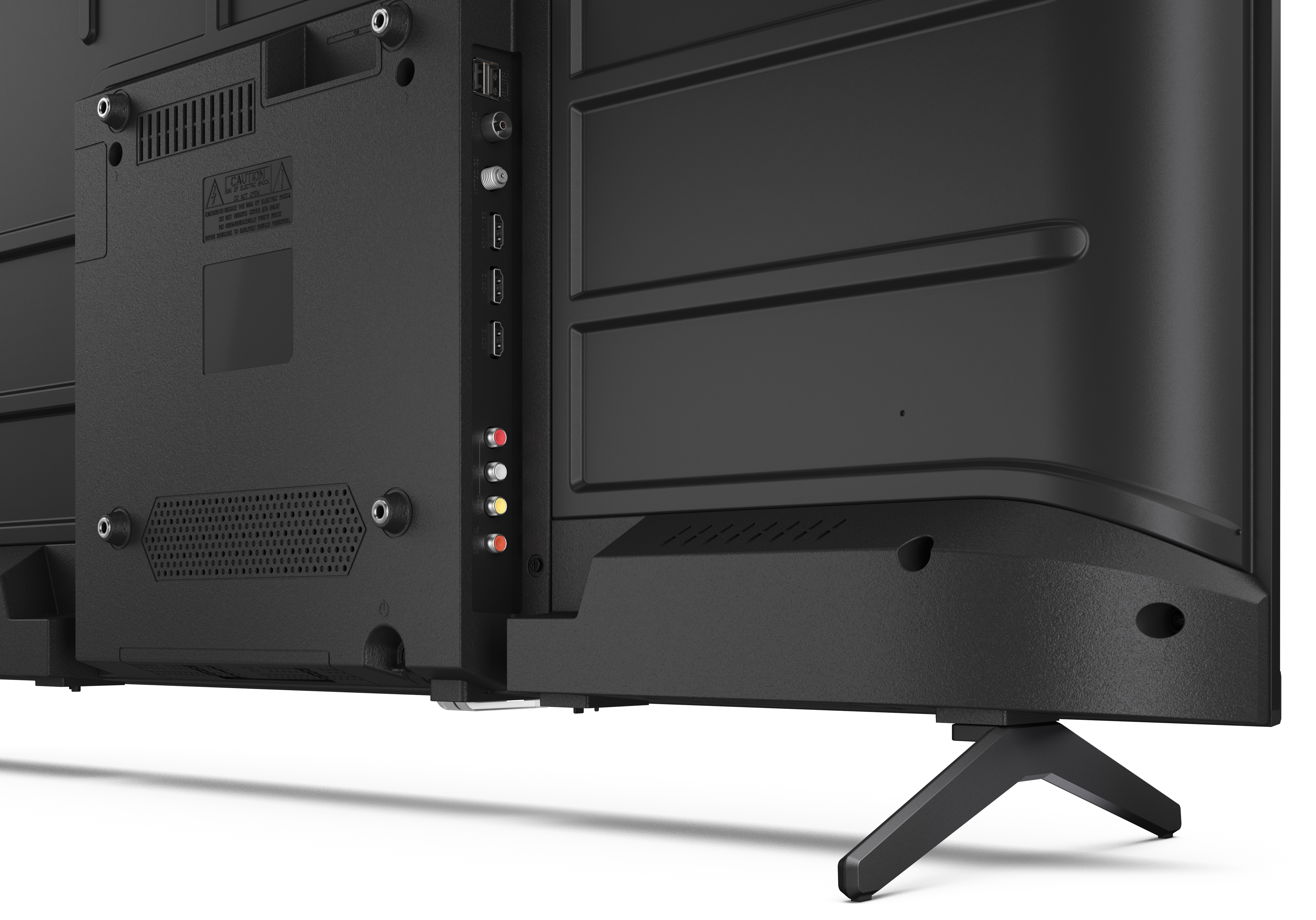 Widok z tyłu czarnego telewizora. Pokazuje porty, otwory wentylacyjne i etykietę ostrzegawczą. Czarny stojak podtrzymuje telewizor.