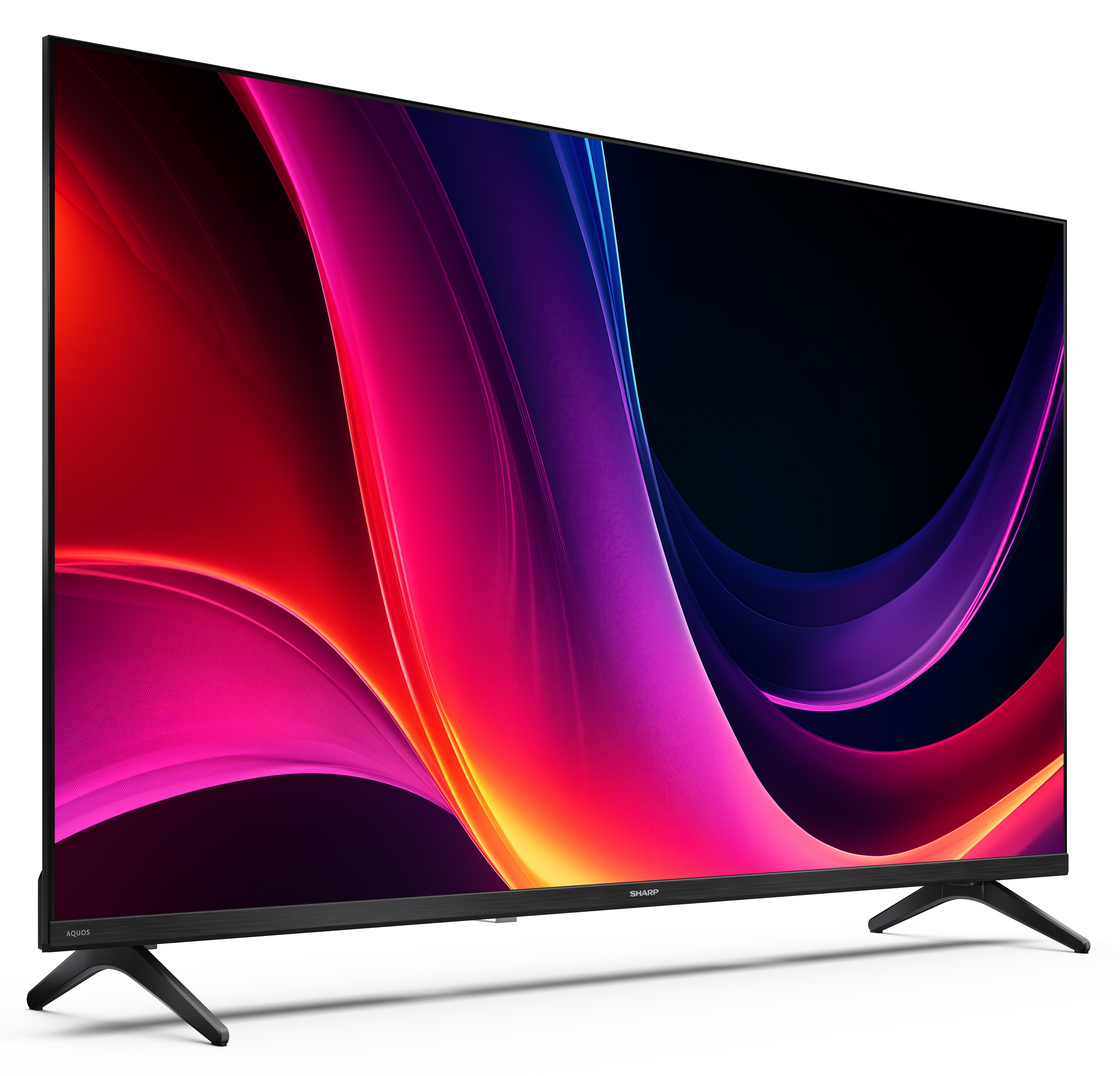 Telewizor Sharp z czarną ramką. Wyświetla kolorową sztukę abstrakcyjną z odcieniami czerwieni, różu, fioletu i niebieskiego.