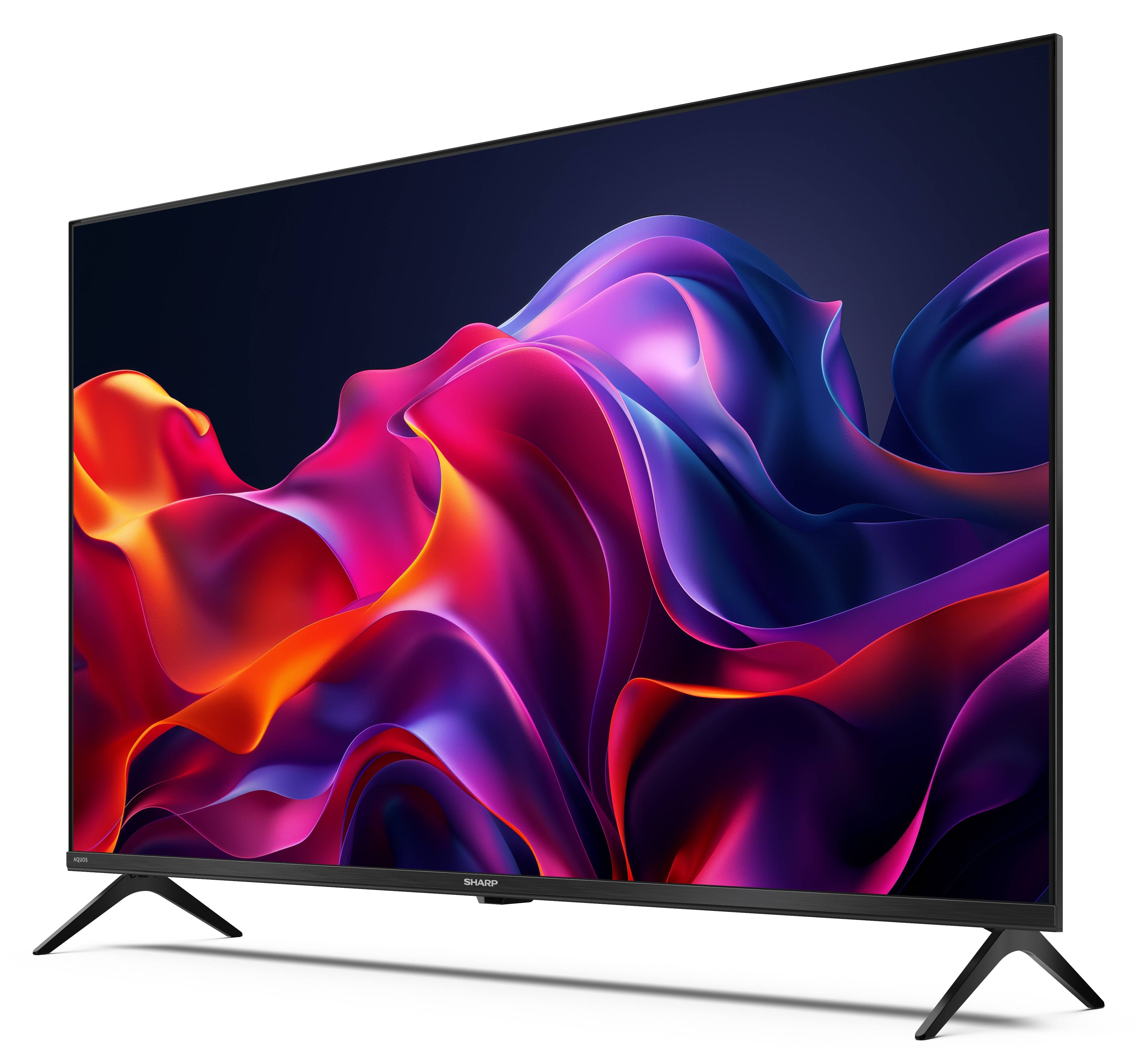 Telewizor Sharp z abstrakcyjną grafiką na ekranie. Telewizor ma czarne nóżki i ramkę. Ekran wyświetla kolorowe fale.