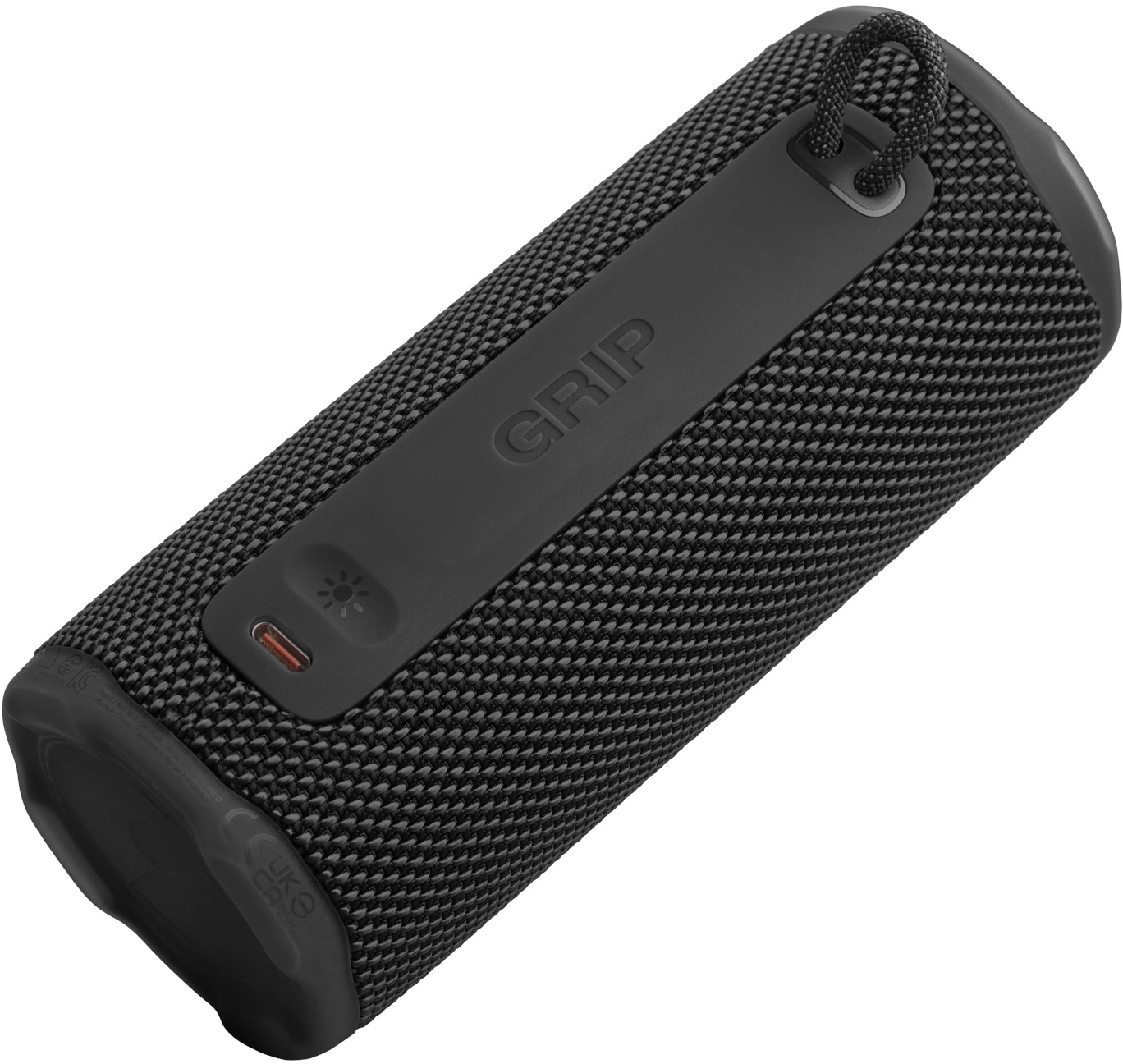 Un haut-parleur cylindrique noir avec une surface texturée. Il a une boucle pour accrocher et le mot 'GRIP'.