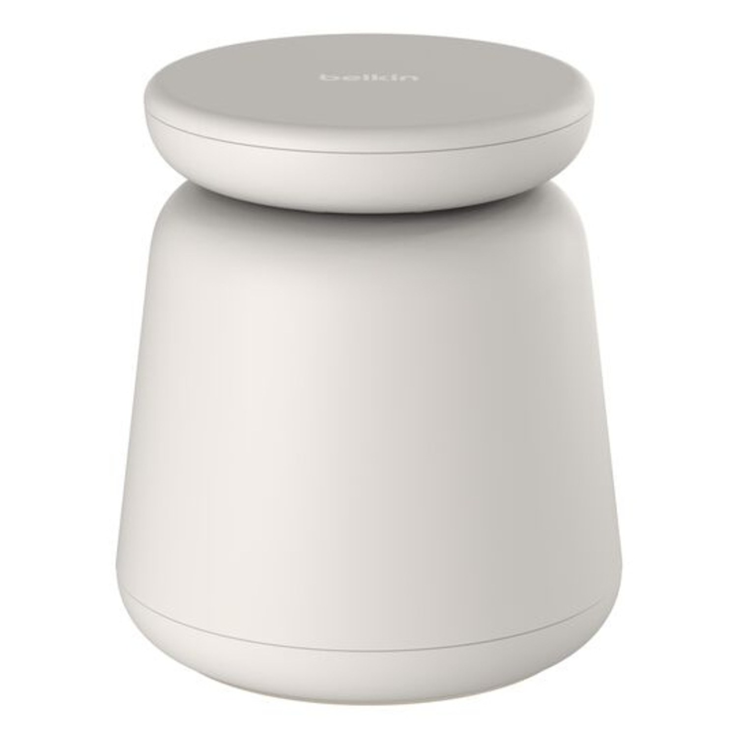 A white, two-part Belkin wireless charger. The top is a flat disc, the base is a rounded, inverted cone.