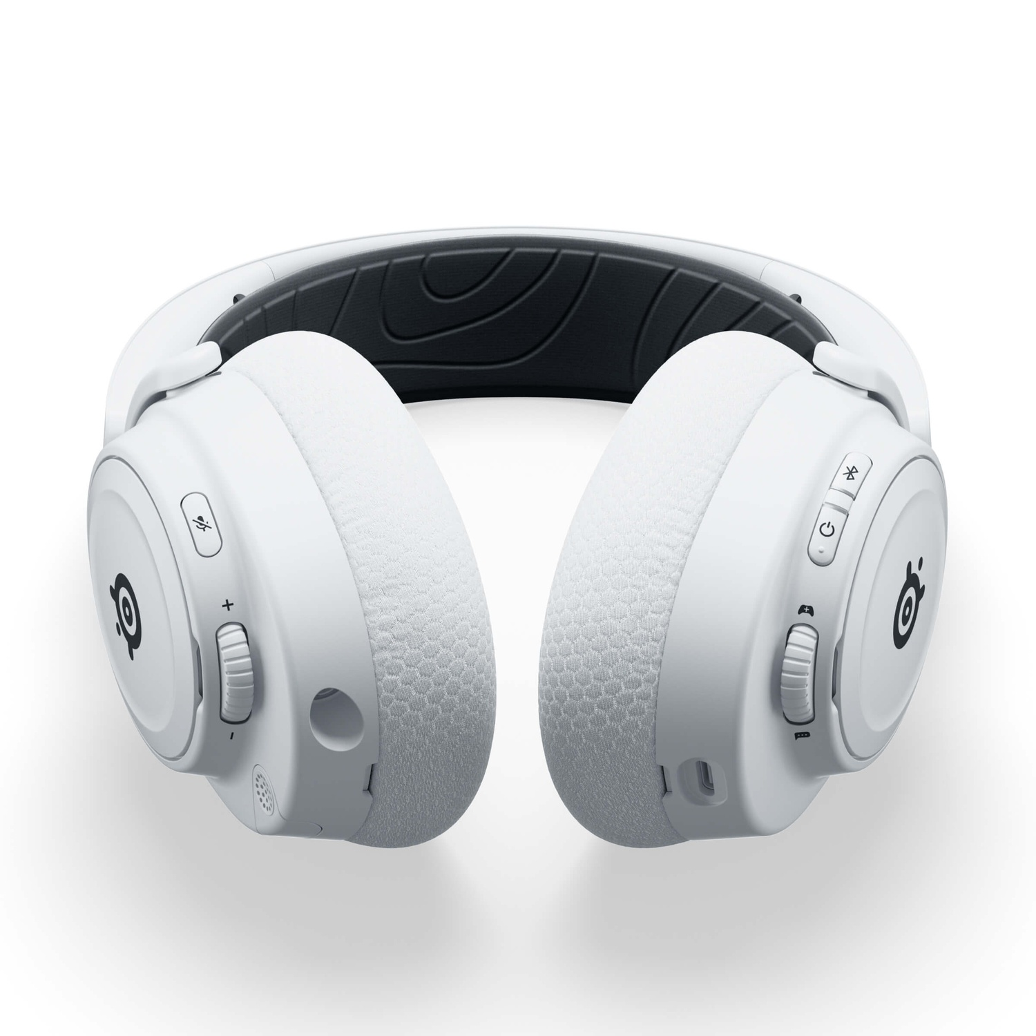 White wireless headphones with black accents. Features include volume controls, power button, and SteelSeries logo. Isolated on white background.