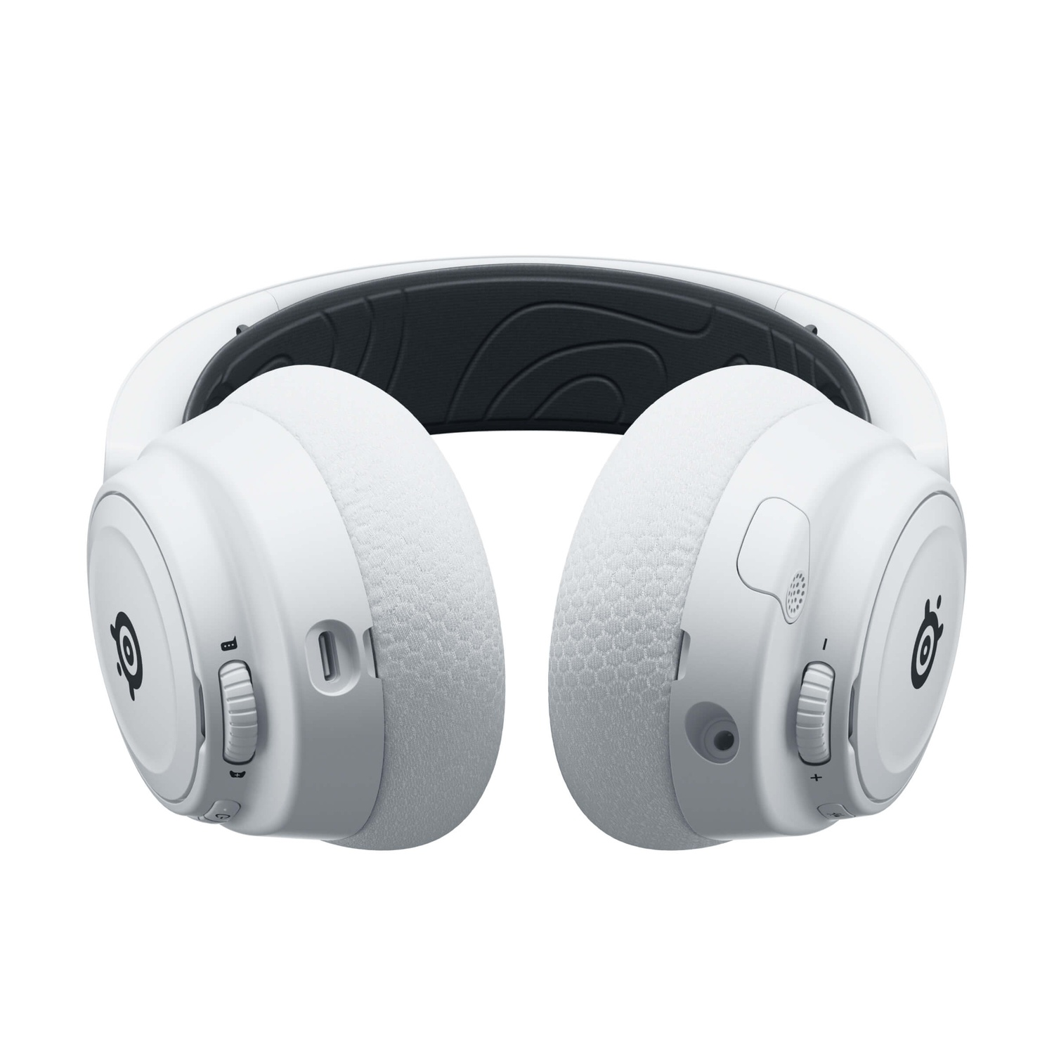 A white gaming headset. It has earcups, a headband, and controls on the earcups. The background is white.