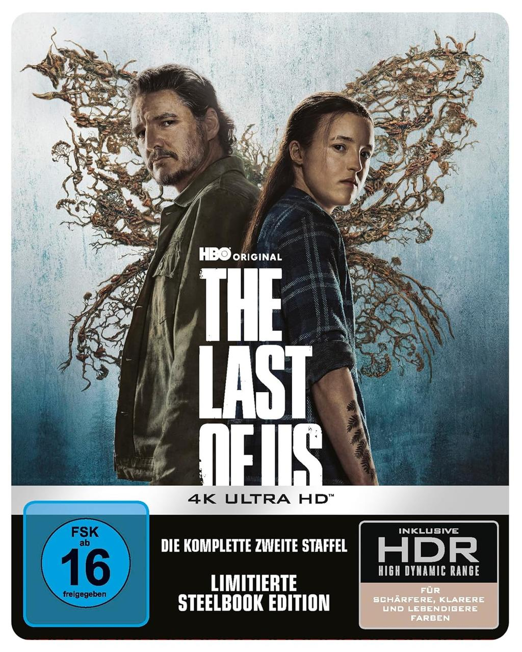 Cover von "The Last of Us" 4K UHD. Zwei Personen stehen Rücken an Rücken. Der Titel steht in großen weißen Buchstaben. Mit HDR und Altersfreigabe.