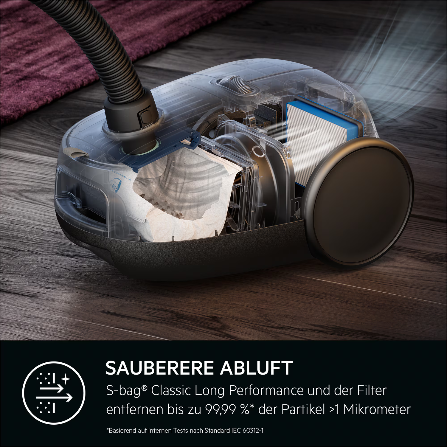 A transparent vacuum cleaner with filter and bag is on a wooden floor. A hose is attached to the top. Text: Cleaner Exhaust, S-bag Classic.