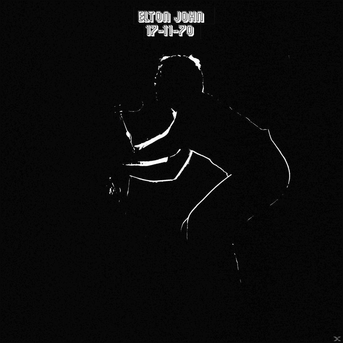 Elton John sziluettje zongorázik. Fehér felirat: 'Elton John 17-11-70' fekete háttéren.