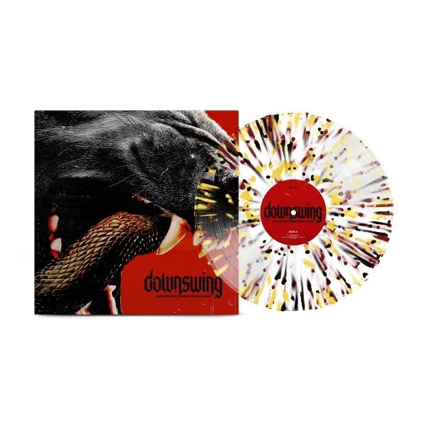 Schallplatte mit buntem Splatter-Design neben Albumcover mit schwarzem Panther und Schlange.
