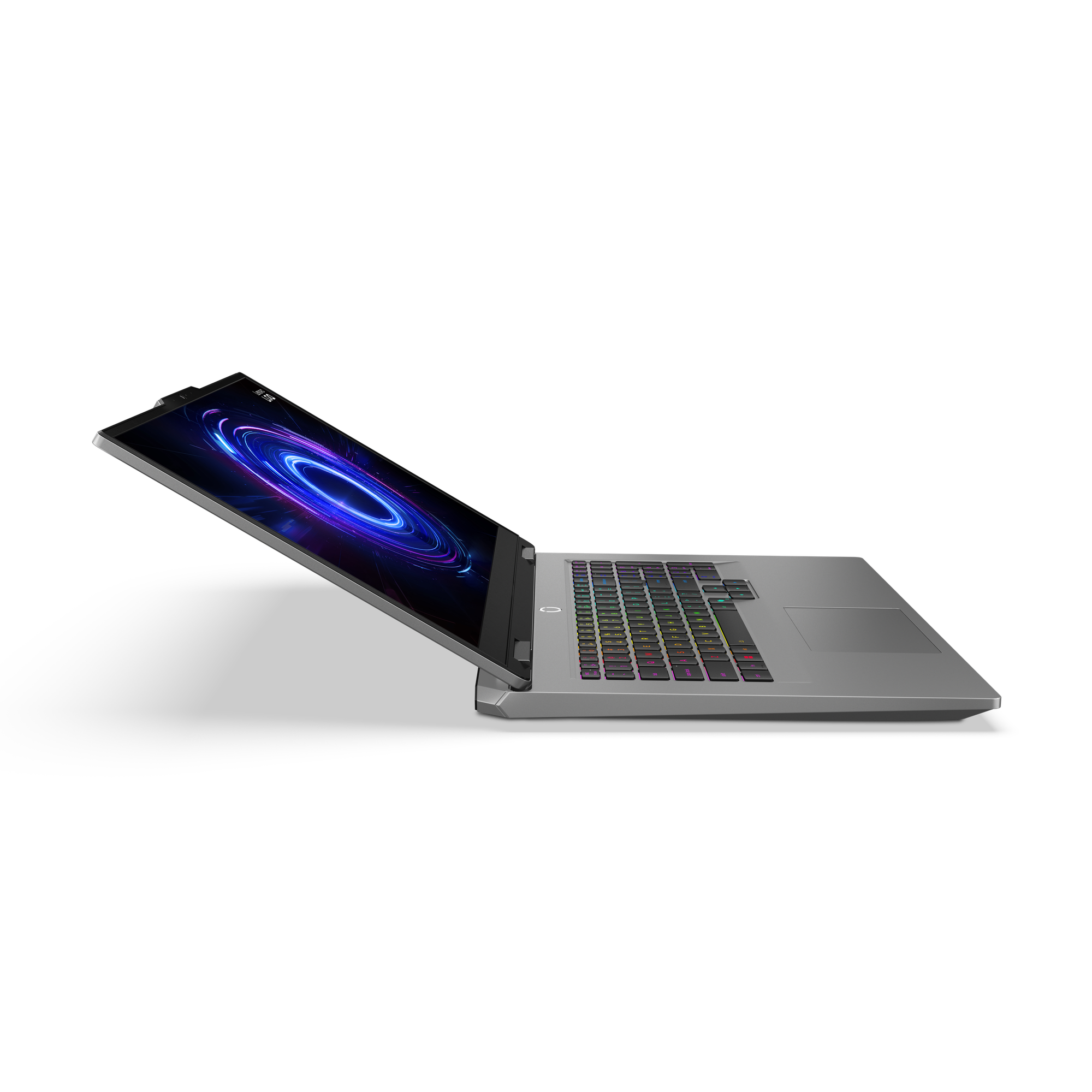 Ein grauer Laptop ist leicht geöffnet auf schwarzem Hintergrund. Der Bildschirm zeigt ein farbenfrohes Design.