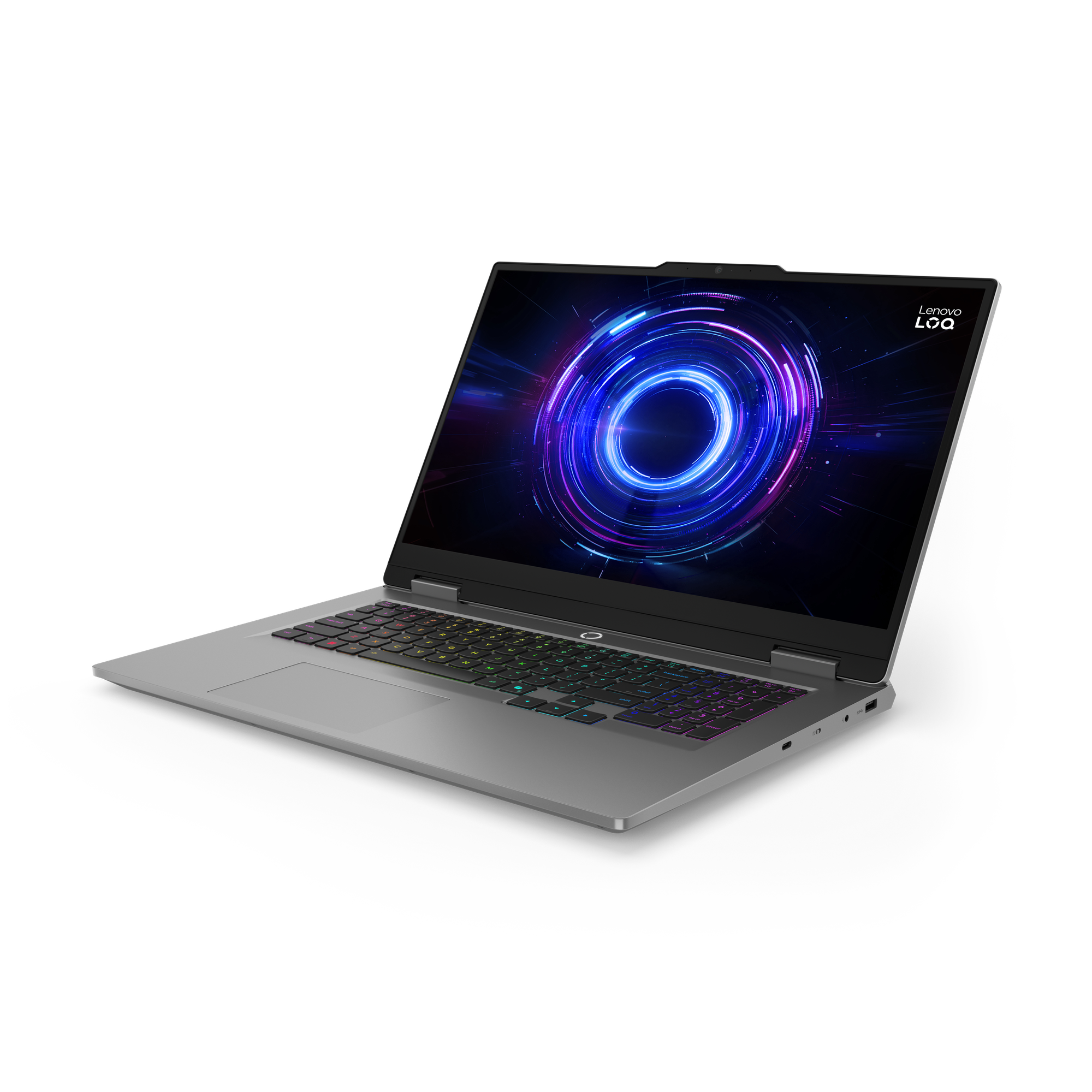 Ein silberner Laptop mit bunter Tastatur. Der Bildschirm zeigt ein blaues und violettes abstraktes Design, schwarzer Hintergrund.