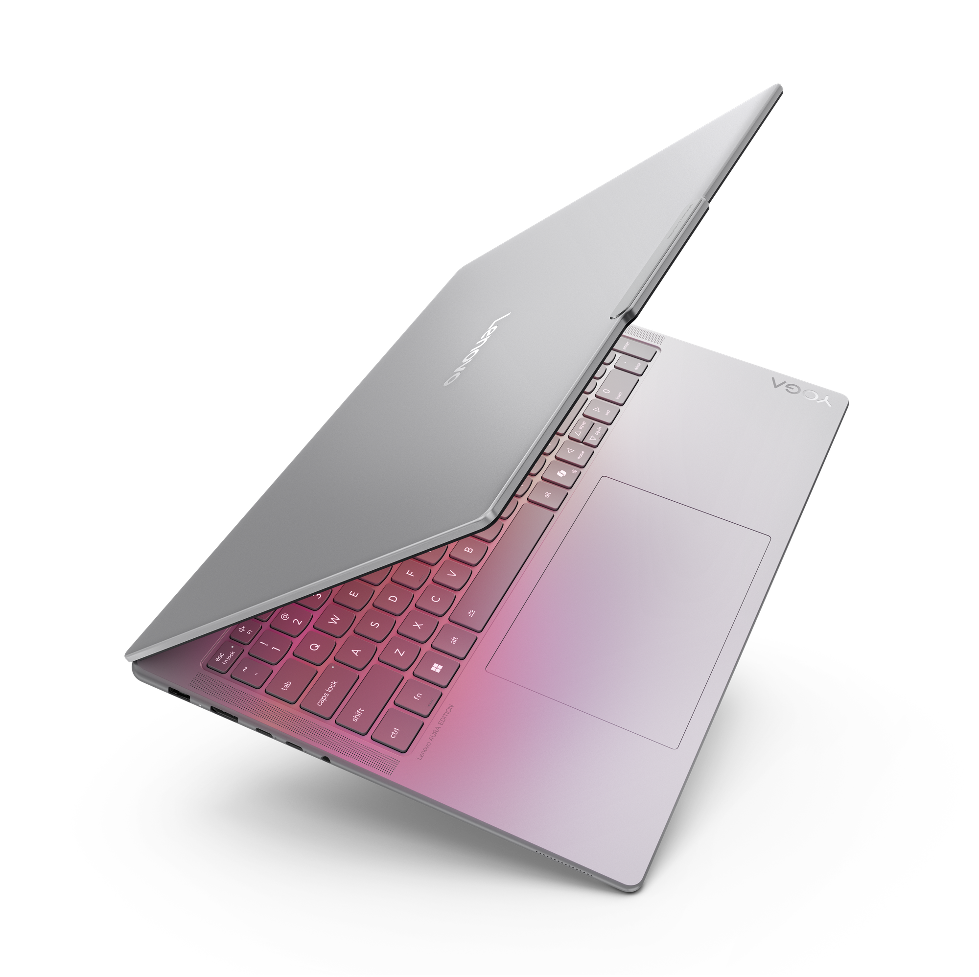 Zilveren Lenovo laptop met roze verlicht toetsenbord, open op zwarte achtergrond. Het woord 'YOGA' is zichtbaar.