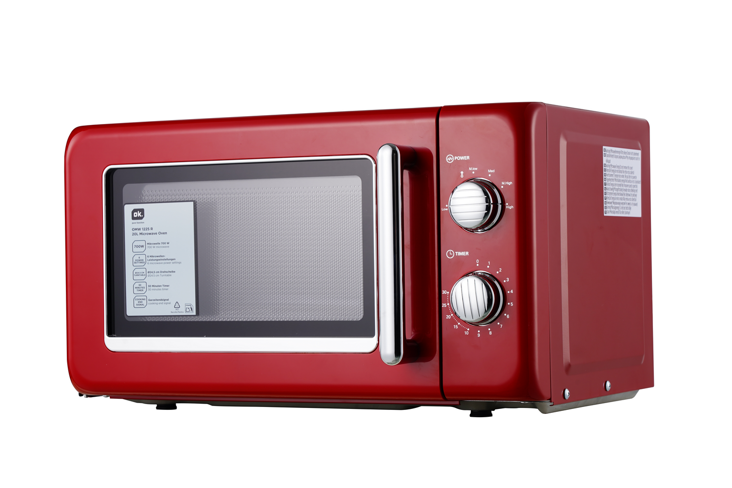Un horno microondas rojo con mandos. La puerta es de cristal. El microondas tiene una etiqueta a la izquierda.