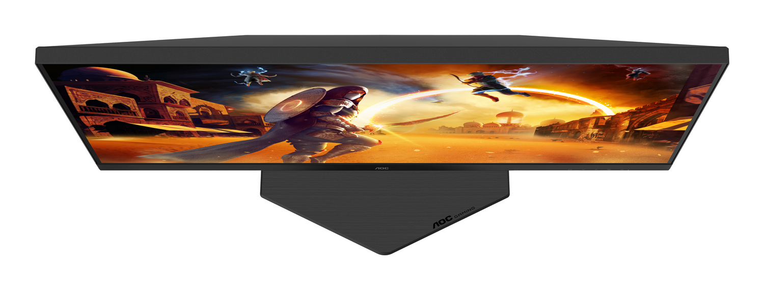 Monitor de juegos AOC que muestra una escena desértica con figuras luchando. El monitor es negro y está en ángulo.