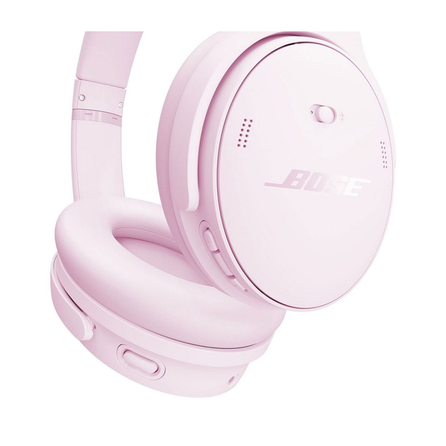Un paio di cuffie Bose rosa chiaro. Le cuffie sono su sfondo bianco. Il nome del marchio è visibile sul lato.
