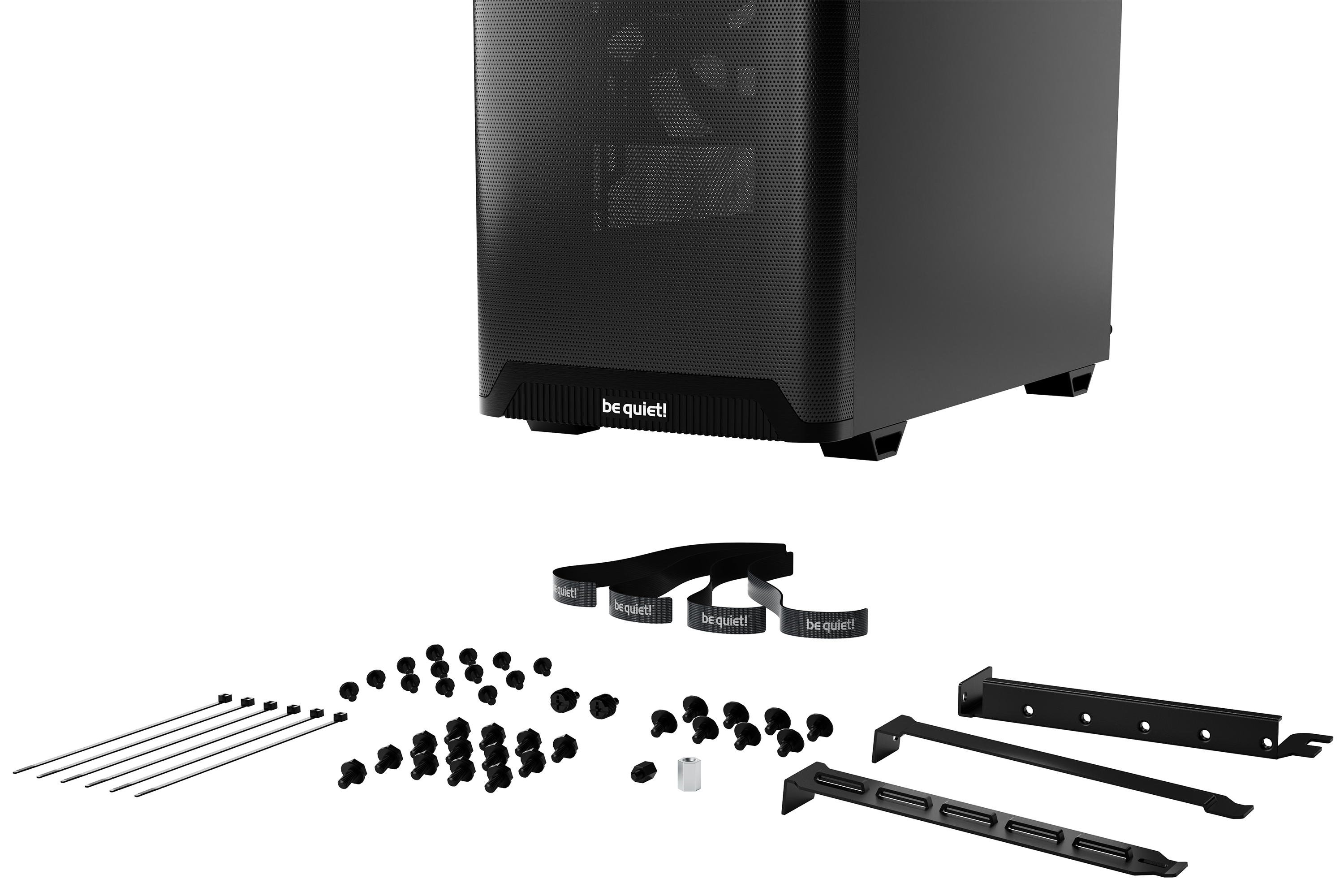 Ein schwarzes Computergehäuse mit Zubehör wie Schrauben, Riemen und Halterungen auf weißem Hintergrund.