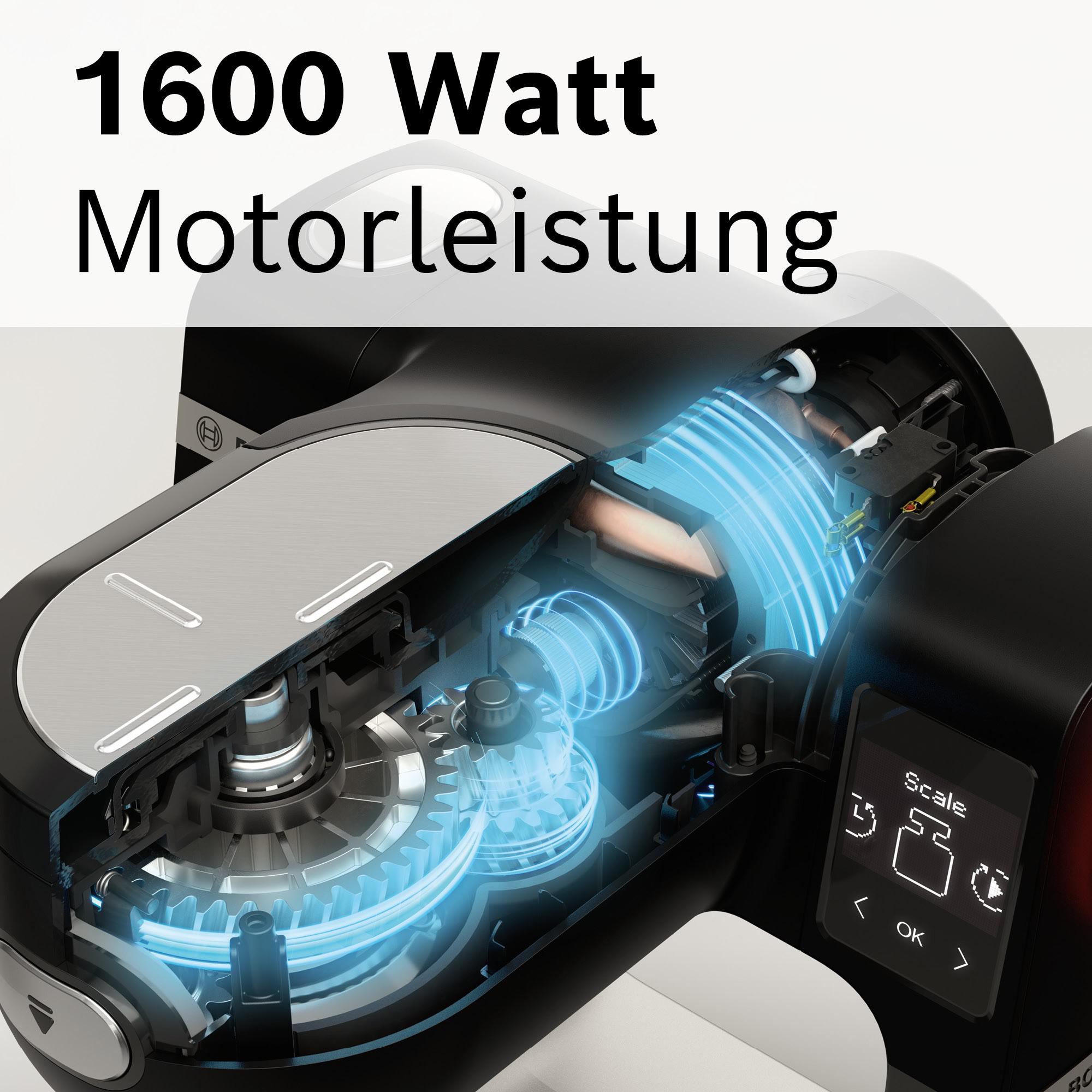 Schnittansicht eines schwarzen Küchengeräts. Text: 1600 Watt Motorleistung. Zahnräder und interne Komponenten sind sichtbar.