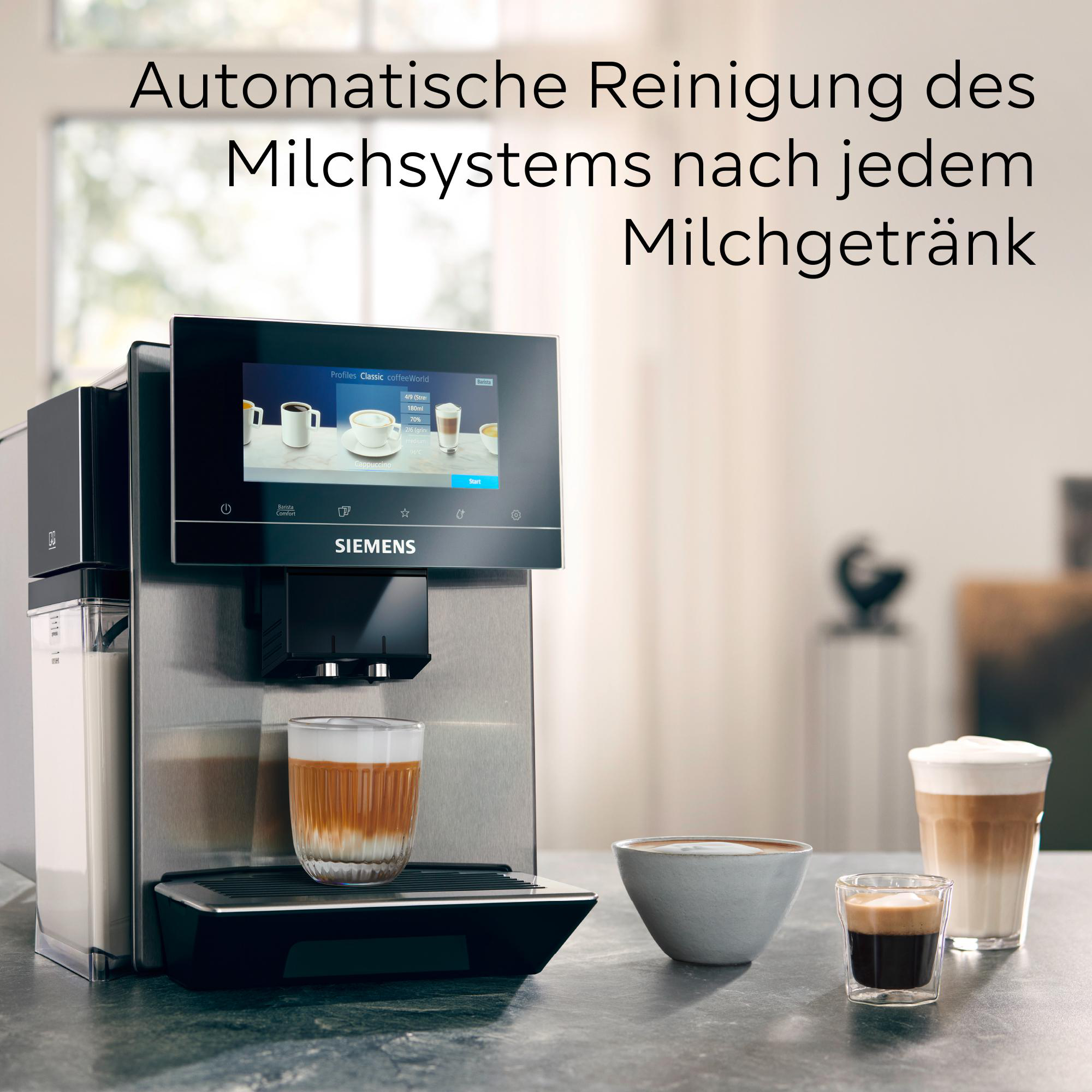 Eine Kaffeemaschine mit Bildschirm wird gezeigt. Auf der Theke stehen mehrere Kaffeetassen. Der Text ist auf Deutsch.
