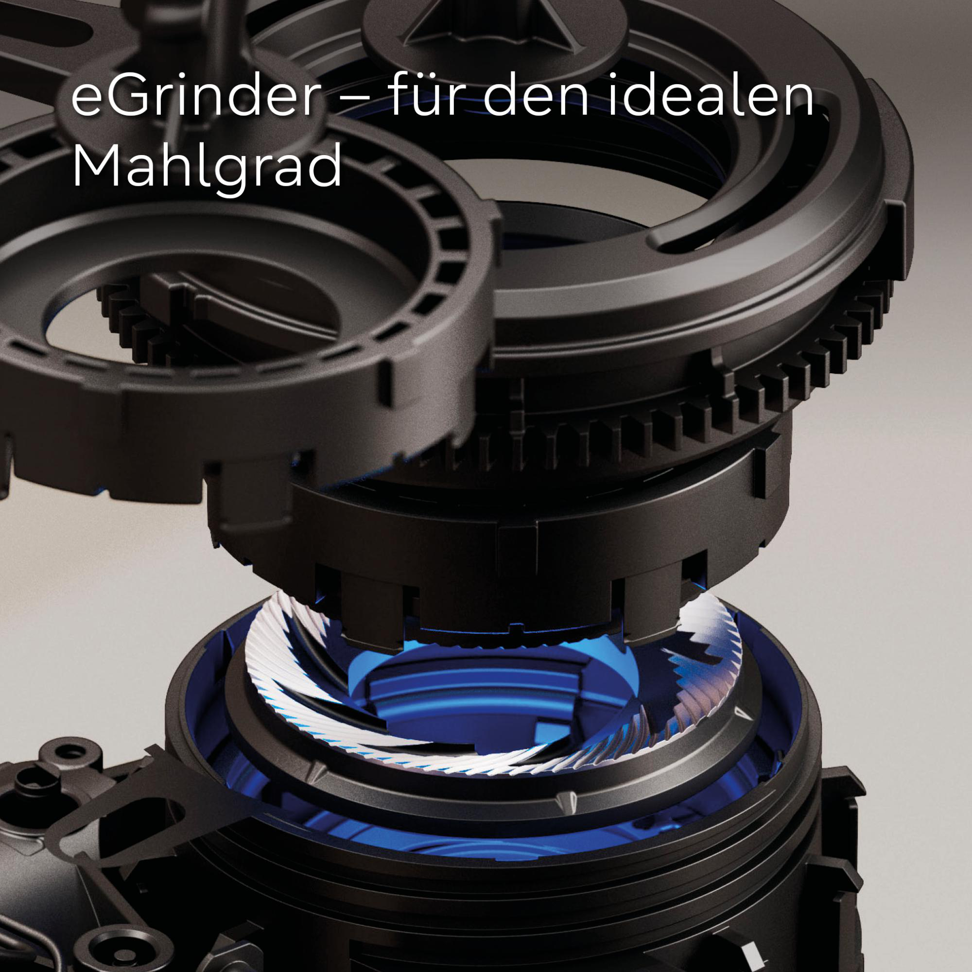 Nahaufnahme eines eGrinders mit sichtbaren Zahnrädern und Klingen. Blaues Licht beleuchtet das Innere.