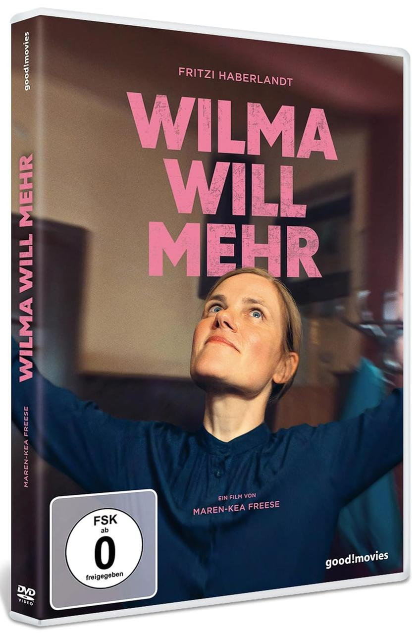 DVD-Cover für 'Wilma Will Mehr'. Eine Frau blickt mit ausgestreckten Armen nach oben. Text enthält Titel und Filmcredits.