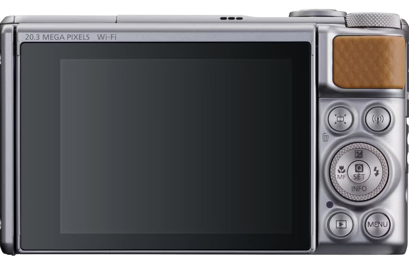 Tył srebrnego aparatu cyfrowego. Ma duży ekran, przyciski i brązowy skórzany uchwyt. Tekst brzmi '20.3 megapikseli' i 'Wi-Fi'.