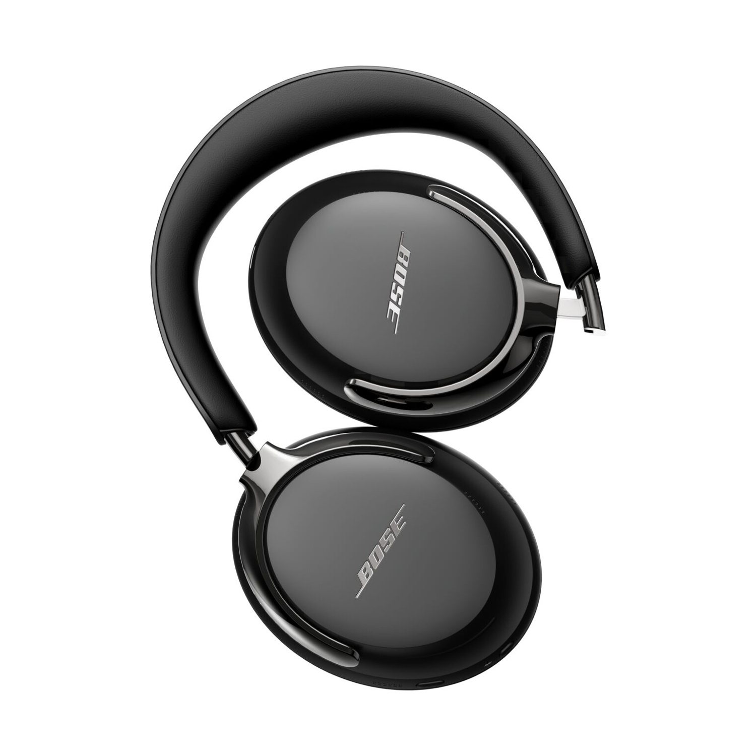 Cuffie Bose nere, vista dall'alto. I padiglioni sono grigio scuro con il logo Bose. L'archetto è nero. Sfondo bianco.