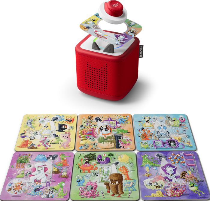 Un altoparlante rosso con un pulsante bianco e sei colorati puzzle a tema mostri. L'altoparlante ha un frontale perforato.