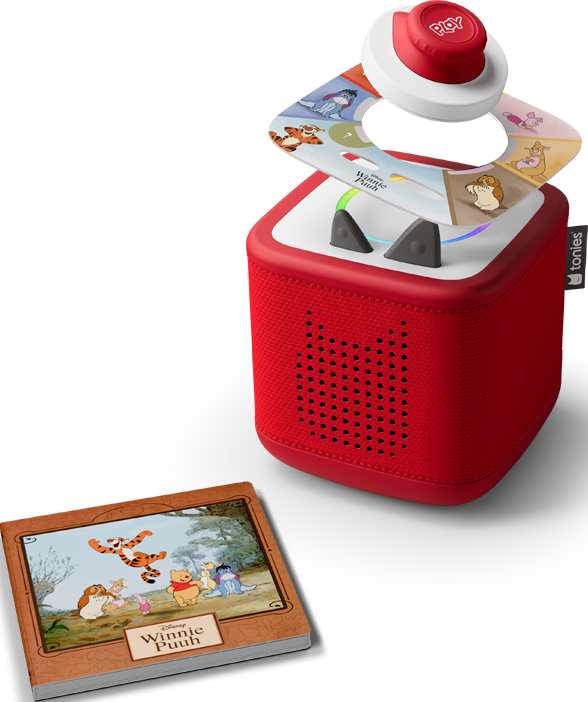 Toniebox rossa con personaggi di Winnie the Pooh, un libro e un disco con personaggi. Il disco ha un pulsante 'play' in alto.