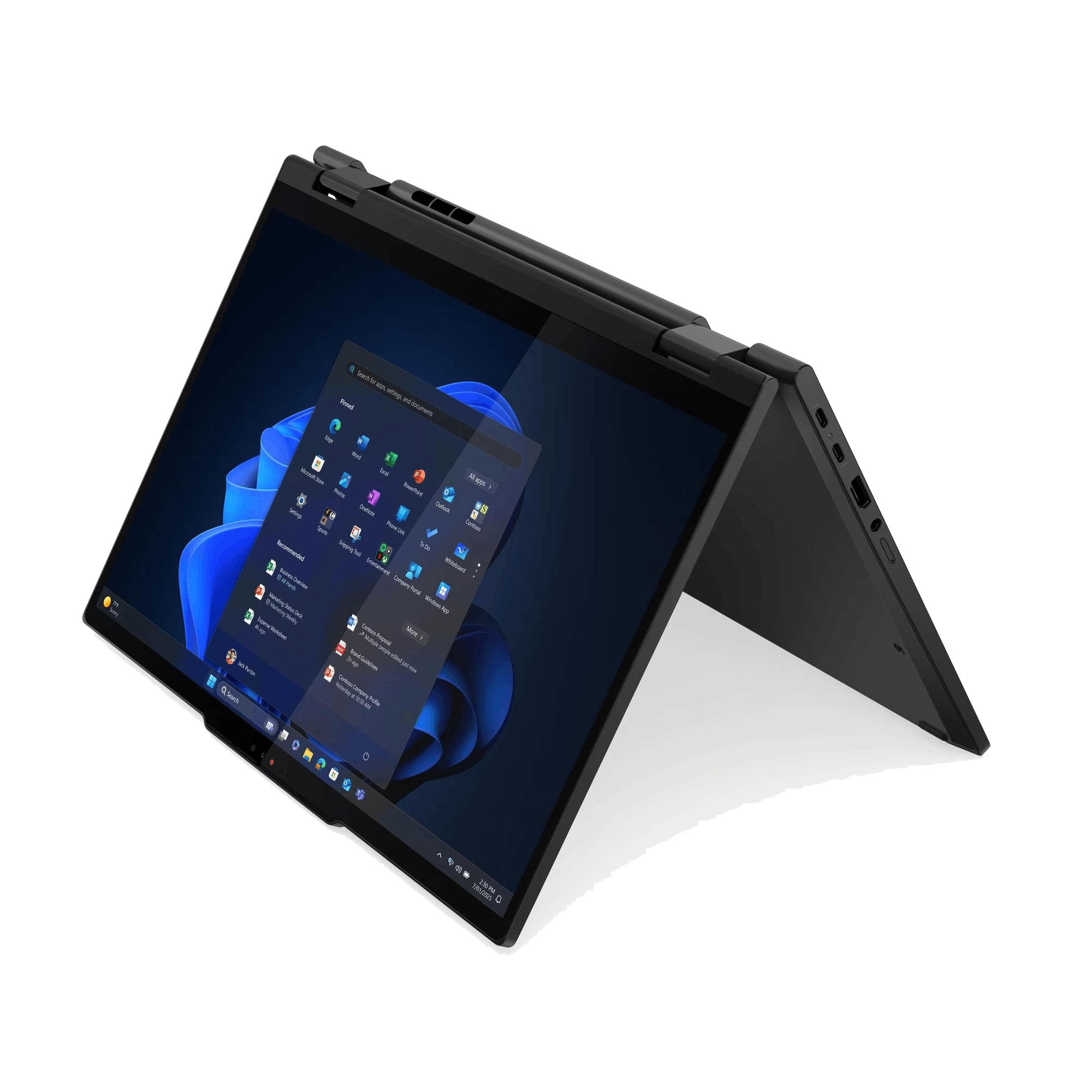Una laptop negra abierta muestra la interfaz de Windows 11. La pantalla tiene iconos de aplicaciones sobre un fondo azul.