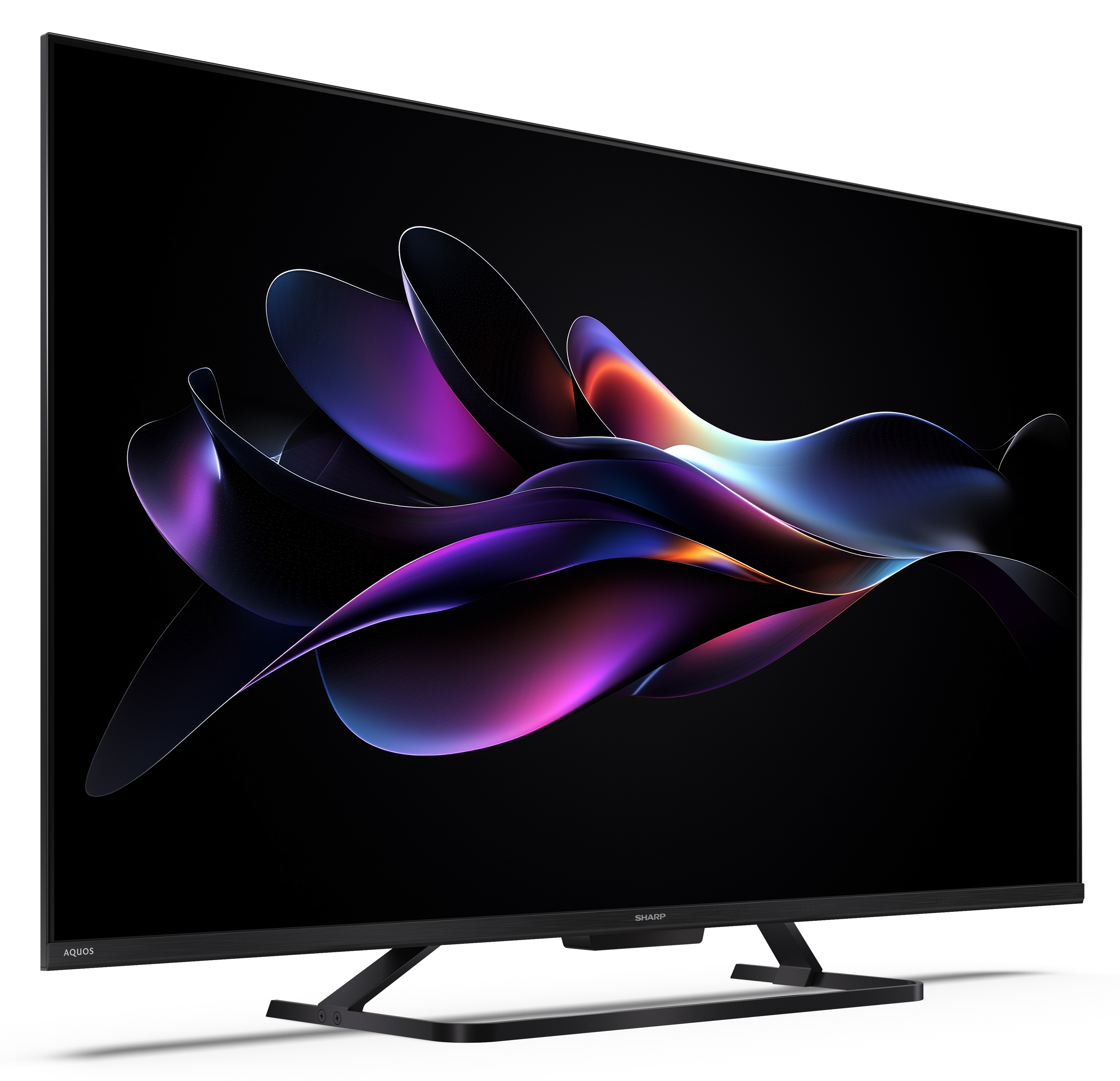 Telewizor Sharp Aquos wyświetla kolorowy, abstrakcyjny wzór. Telewizor jest czarny, na białym tle.