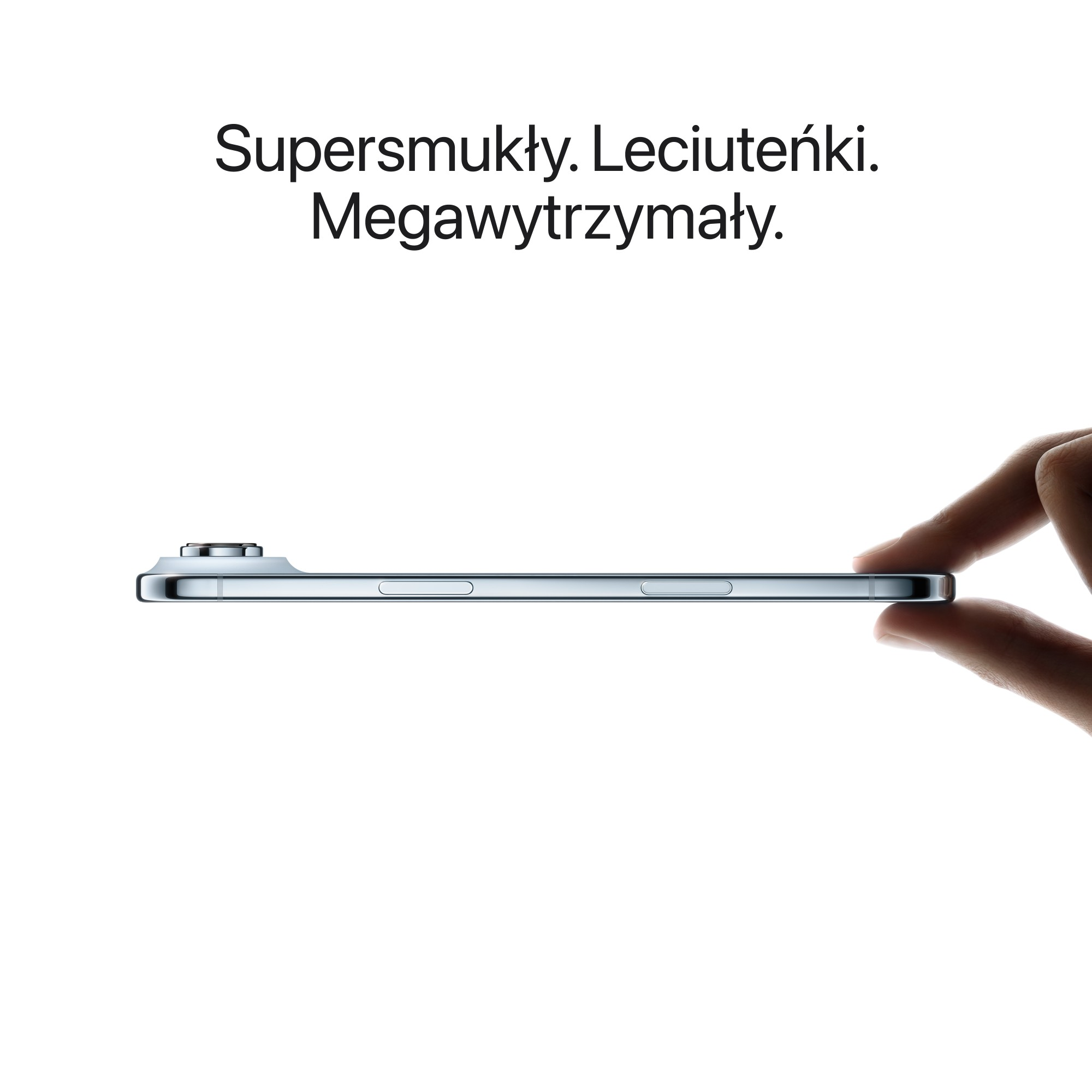 Jasnoniebieski telefon trzymany jest przez dłoń. Tekst: Supersmukły. Leciuteńki. Megawytrzymały.