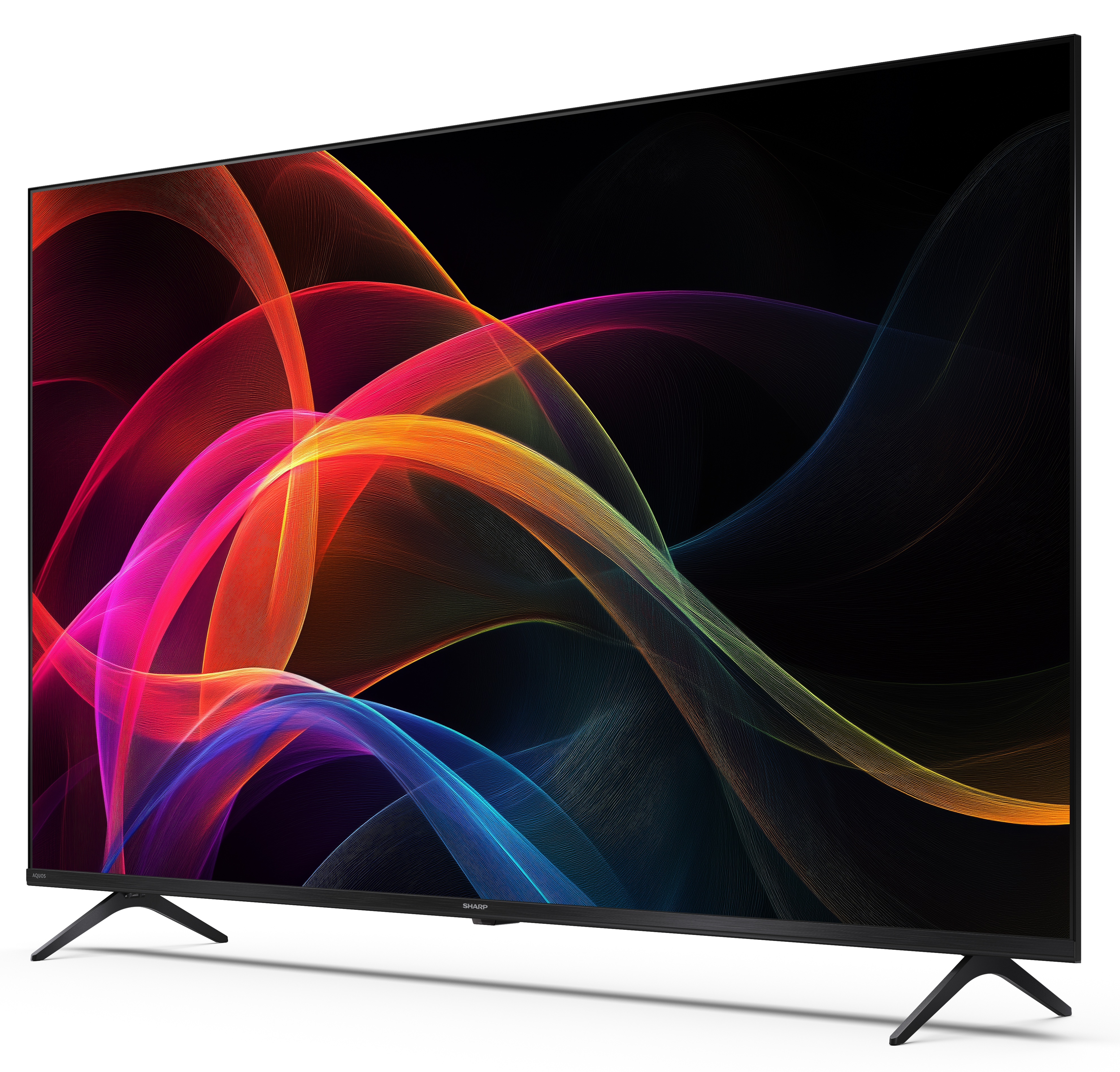 Telewizor Sharp wyświetla kolorowe abstrakcyjne linie na czarnym ekranie. Telewizor jest czarny i ma czarne nogi.