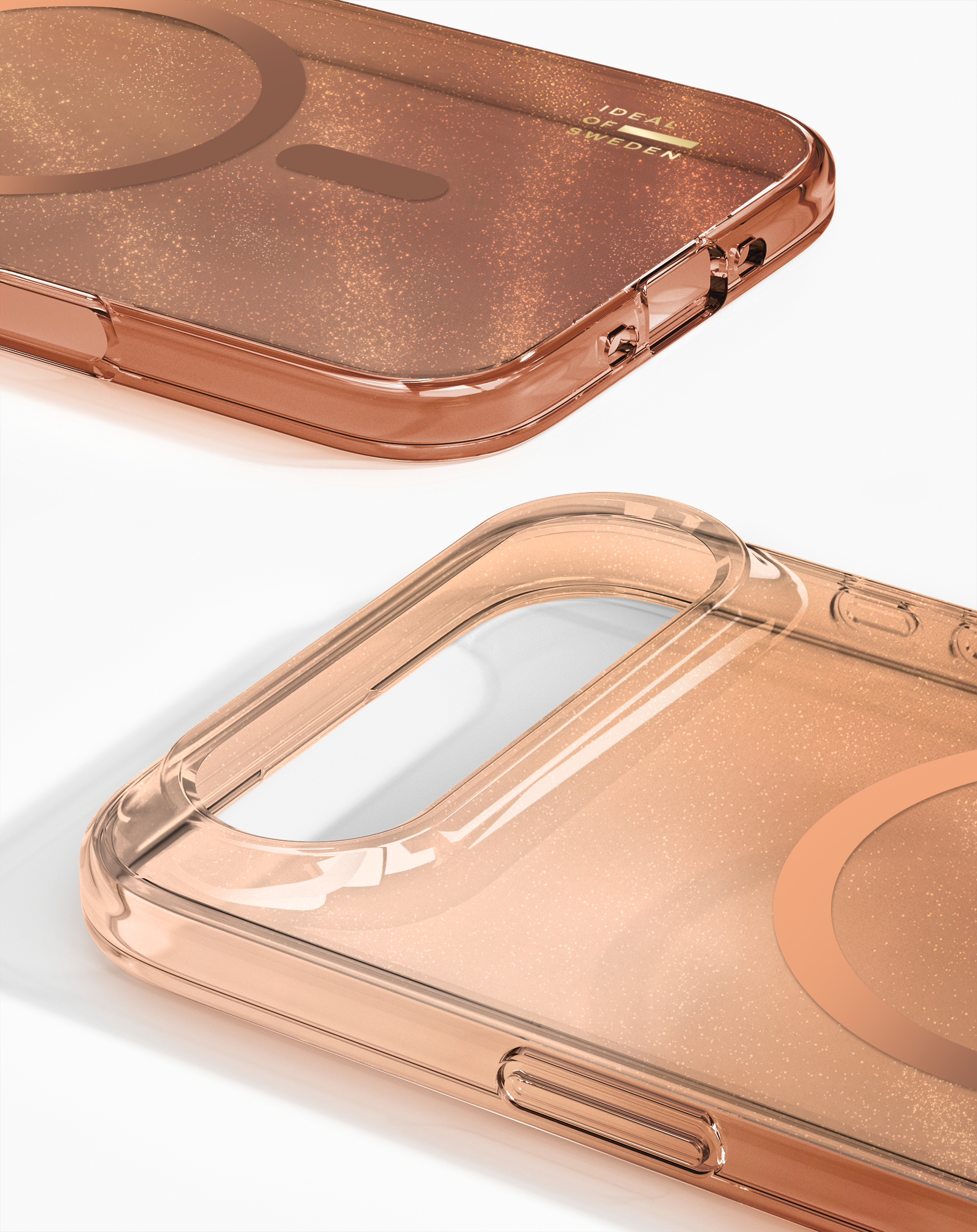 Zwei transparente Handyhüllen, eine mit Ring und die andere mit Kanten. Beide haben einen Glitzereffekt.
