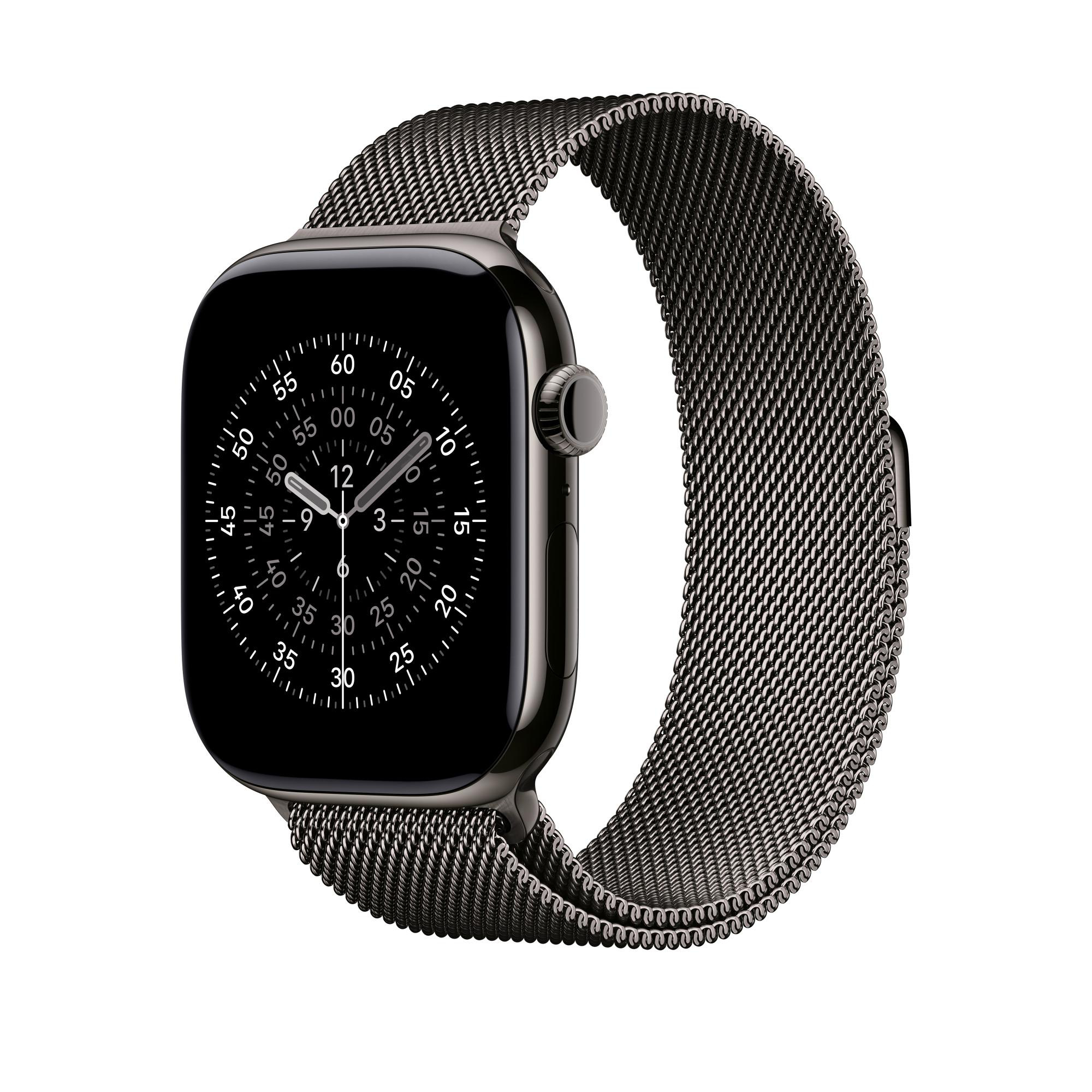 Eine schwarze Apple Watch mit Mesh-Armband zeigt die Uhrzeit an. Die Uhr befindet sich vor weißem Hintergrund.