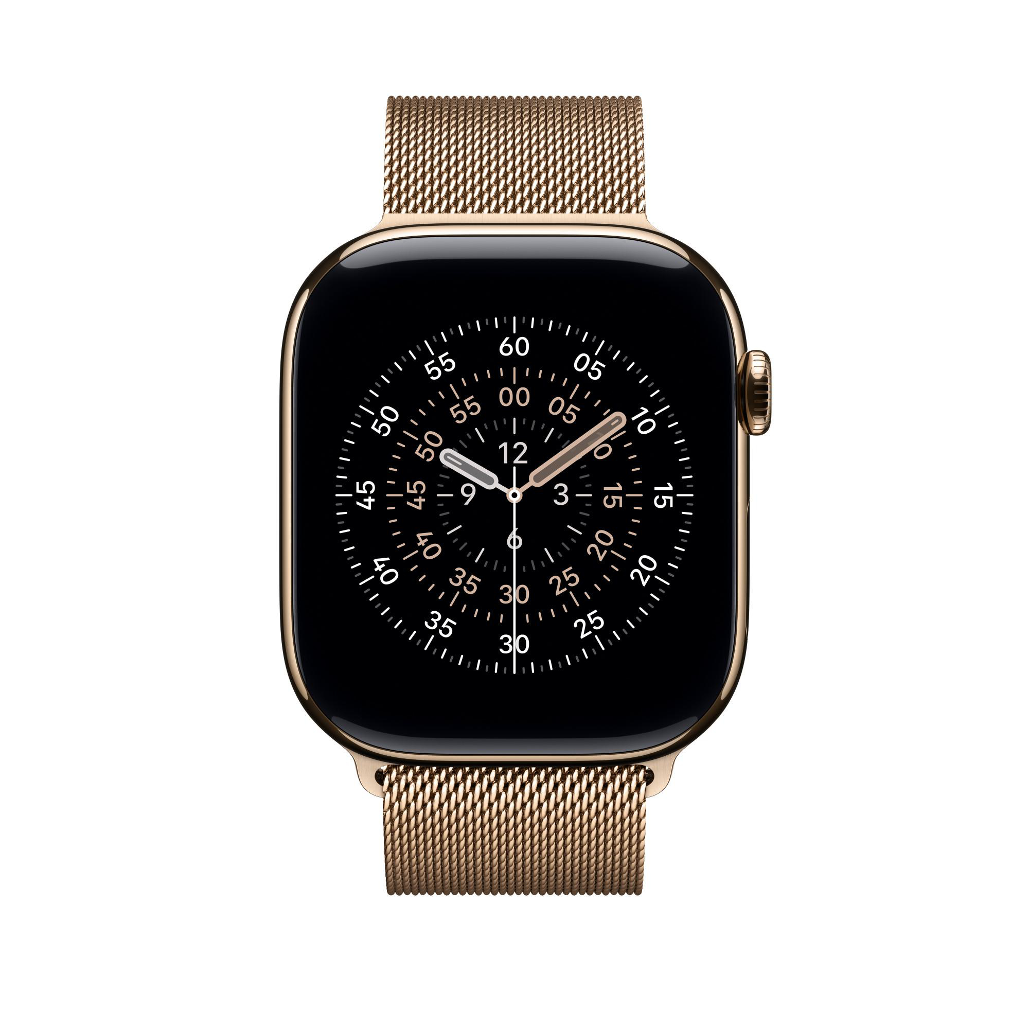 Eine goldene Apple Watch mit schwarzem Zifferblatt, die die Uhrzeit anzeigt. Sie hat ein goldenes Mesh-Armband. Der Hintergrund ist weiß.