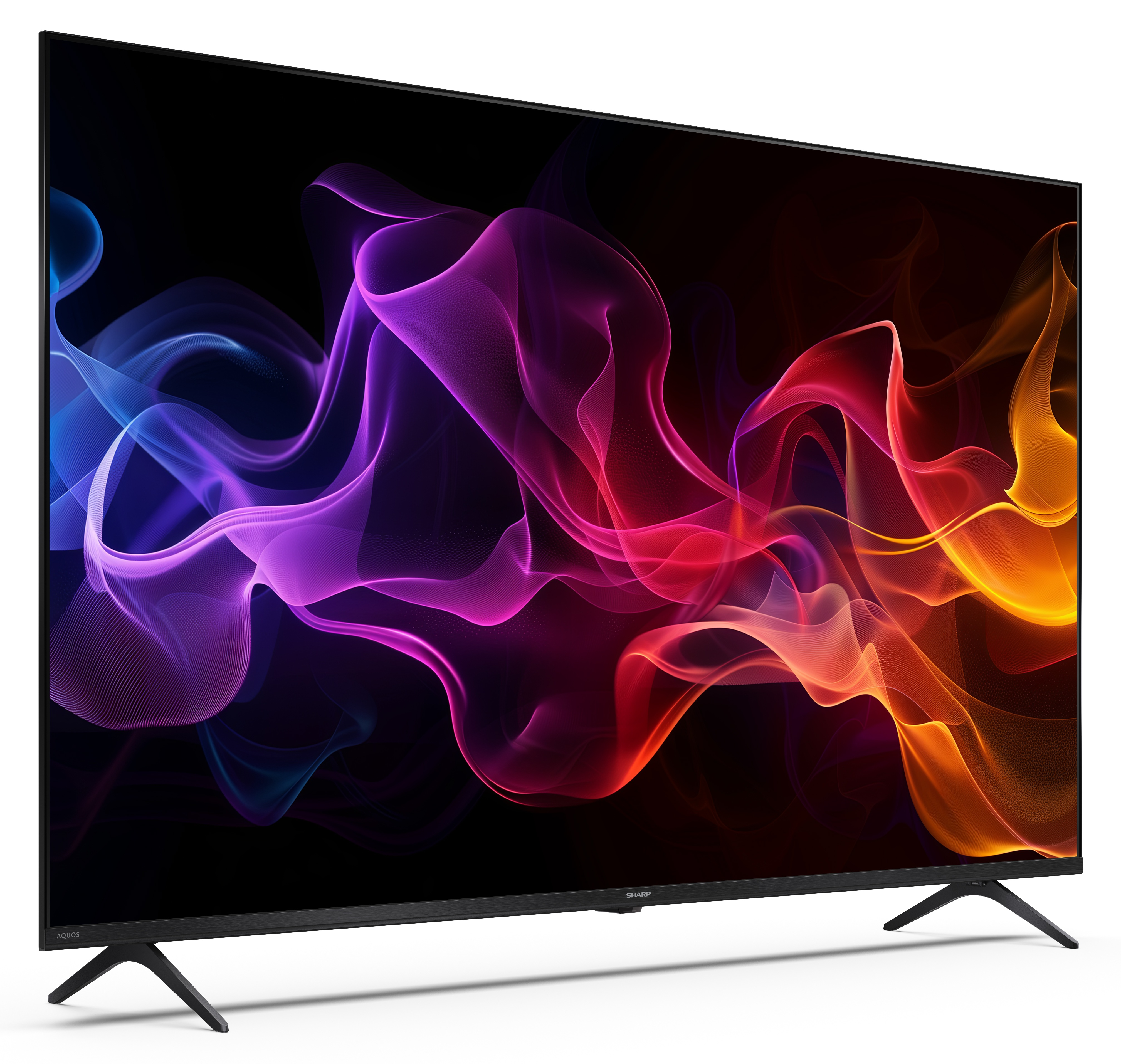 Duży telewizor z czarną ramą. Ekran wyświetla kolorowe, płynące, abstrakcyjne kształty na czarnym tle.