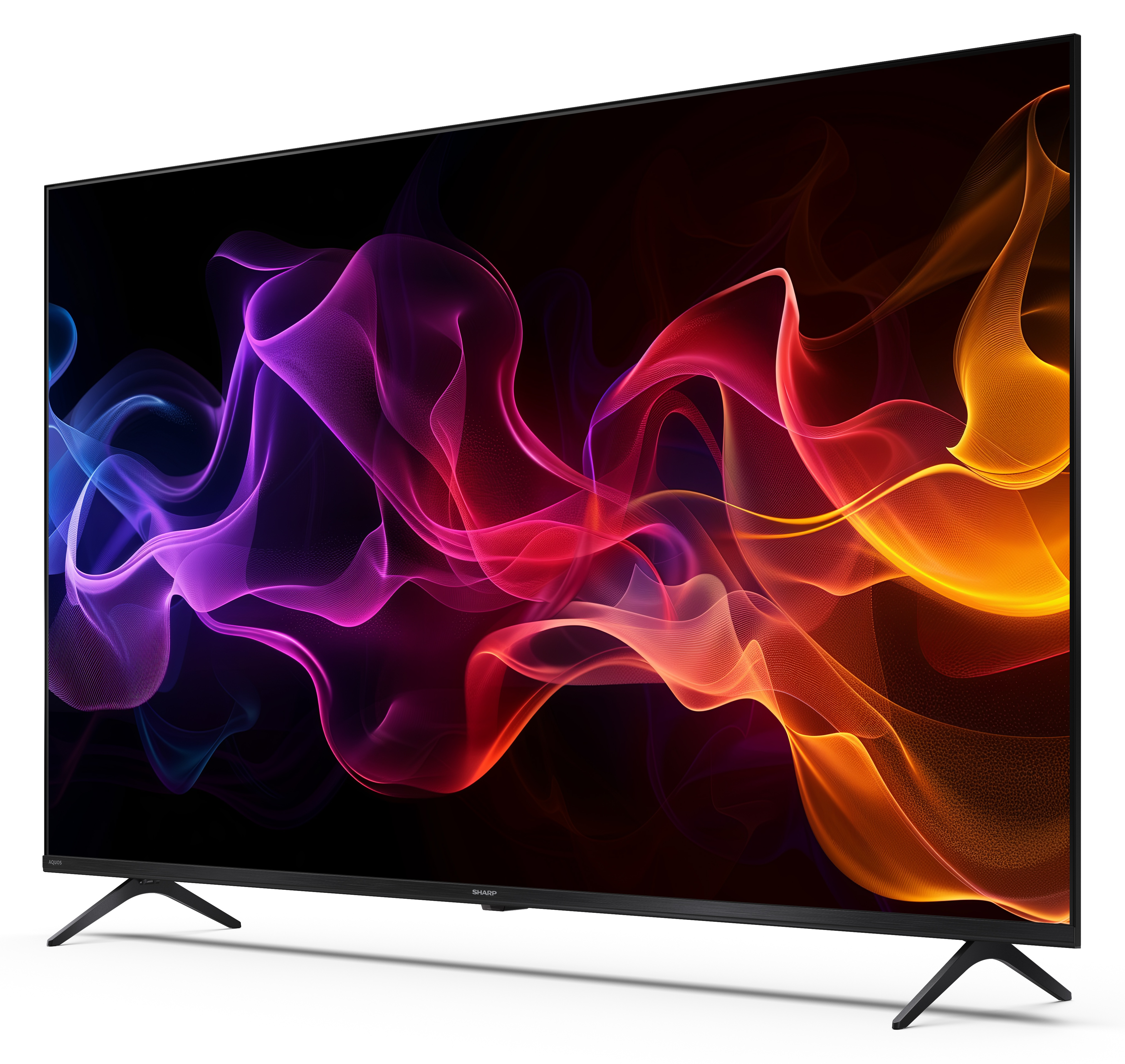 Duży, czarny telewizor Sharp wyświetla kolorowe, płynące abstrakcyjne wzory. Telewizor ma czarne nogi i stoi na białej powierzchni.