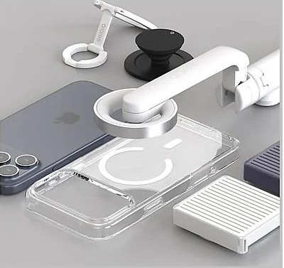 Różne akcesoria do telefonów, w tym przezroczyste etui, biały uchwyt i czarny popsocket. Szare tło.