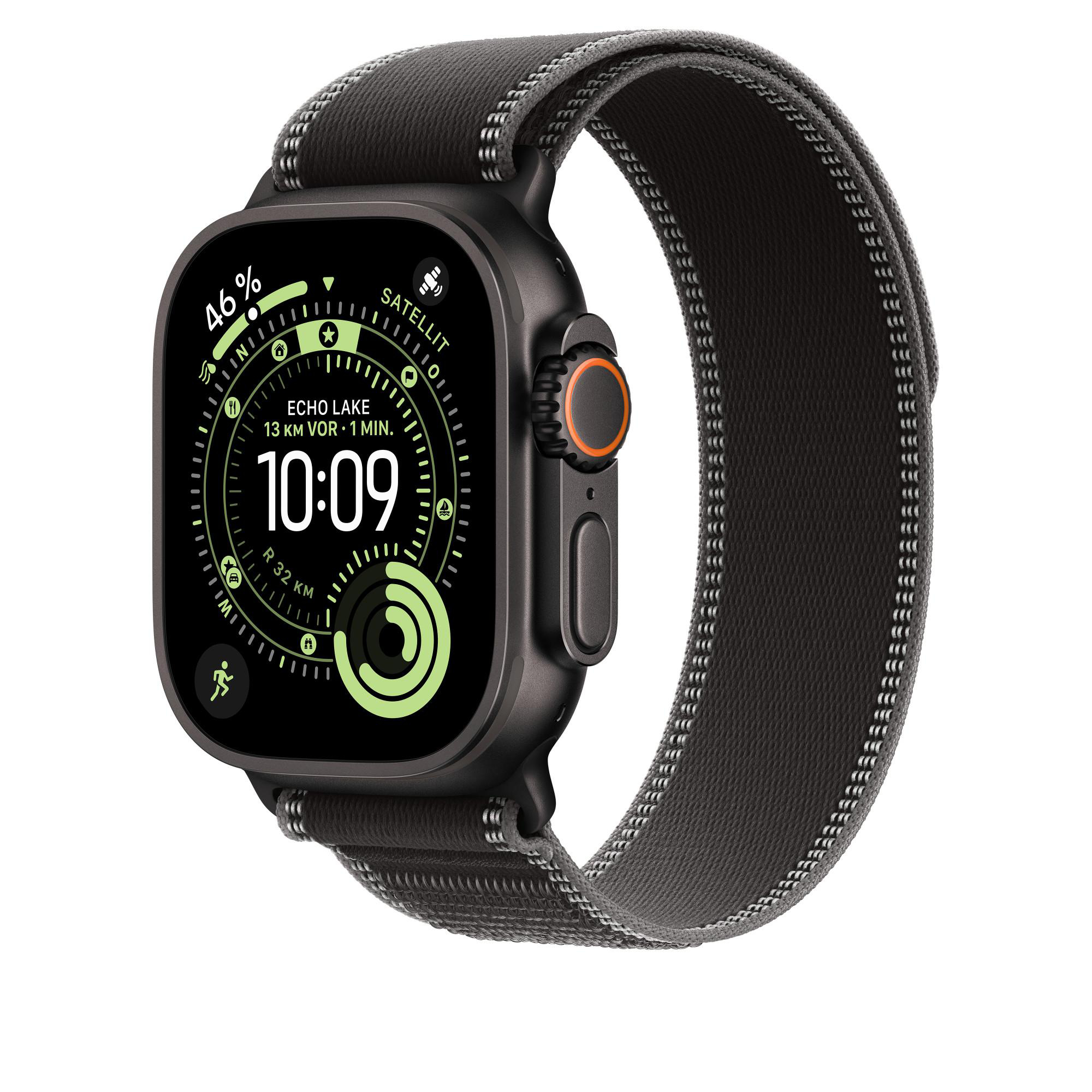 Eine schwarze Smartwatch mit grauem Armband zeigt die Uhrzeit 10:09, 46% Akku und Standortdaten. Das Band ist strukturiert.