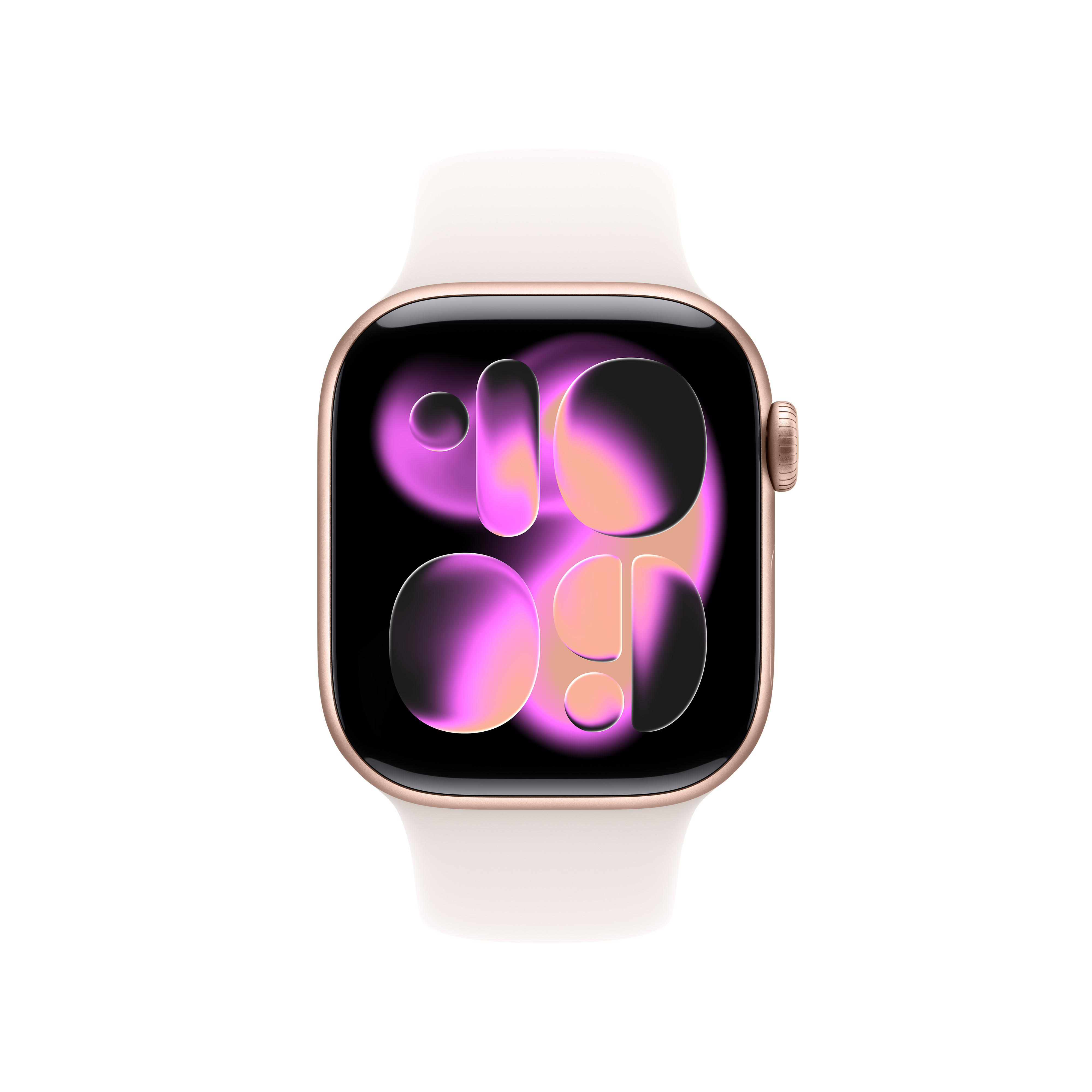 Eine Apple Watch mit goldenem Gehäuse und weißem Armband. Das Zifferblatt zeigt ein farbenfrohes, abstraktes Design.