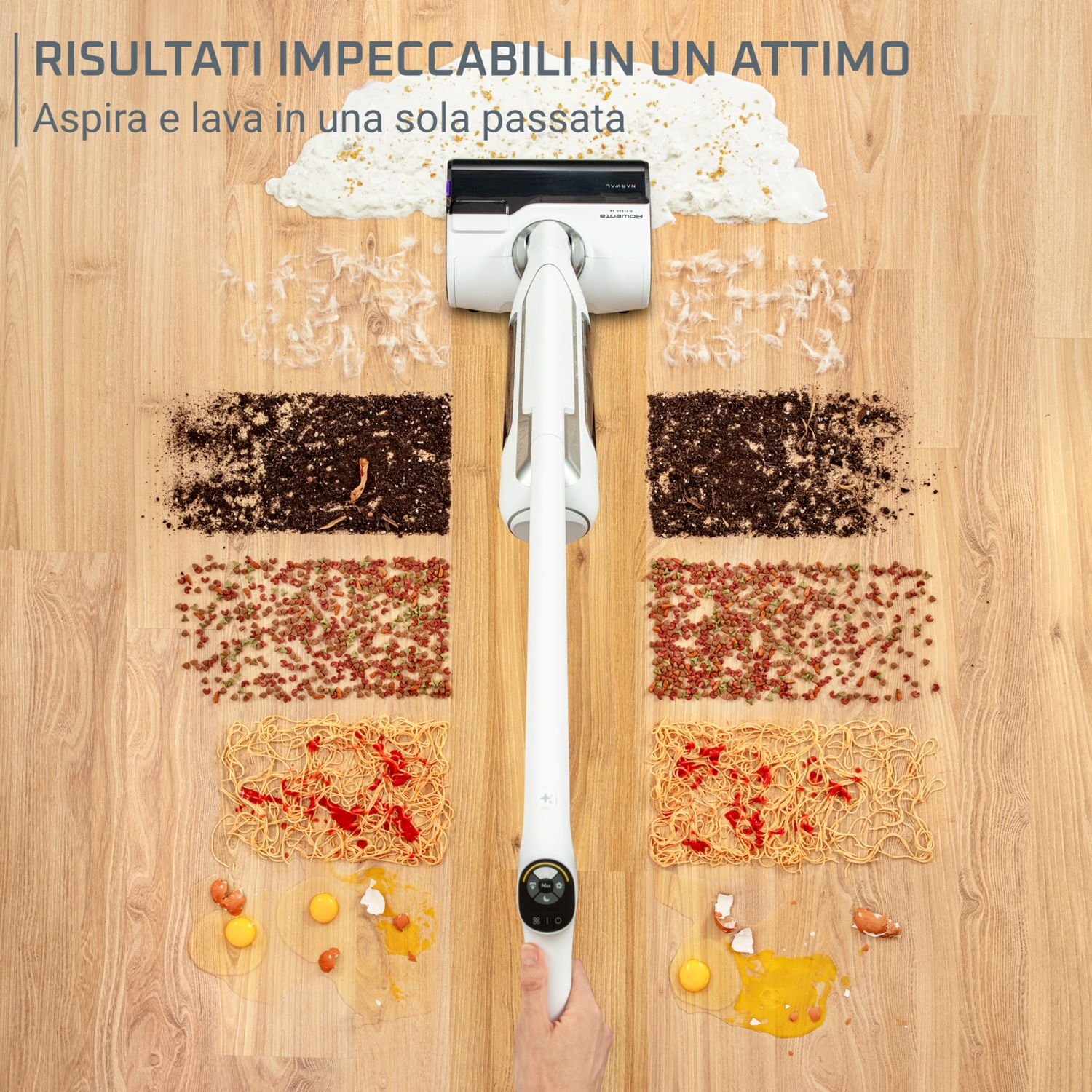 Un aspirapolvere bianco pulisce vari materiali su un pavimento in legno: cibo, capelli, sporco e uova rotte. Il marchio dell'aspirapolvere è Rowenta.