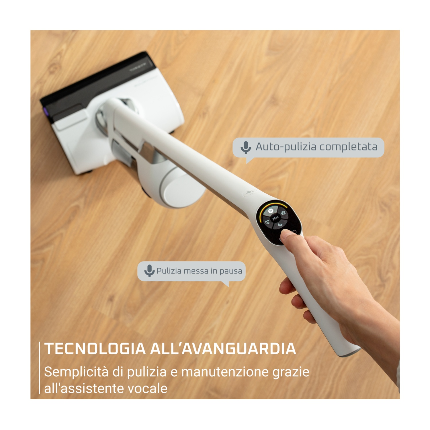 Un aspirapolvere bianco e nero con una mano che tiene l'impugnatura. Le nuvolette di testo dicono 'Auto-pulizia completata' e 'Pulizia messa in pausa'.