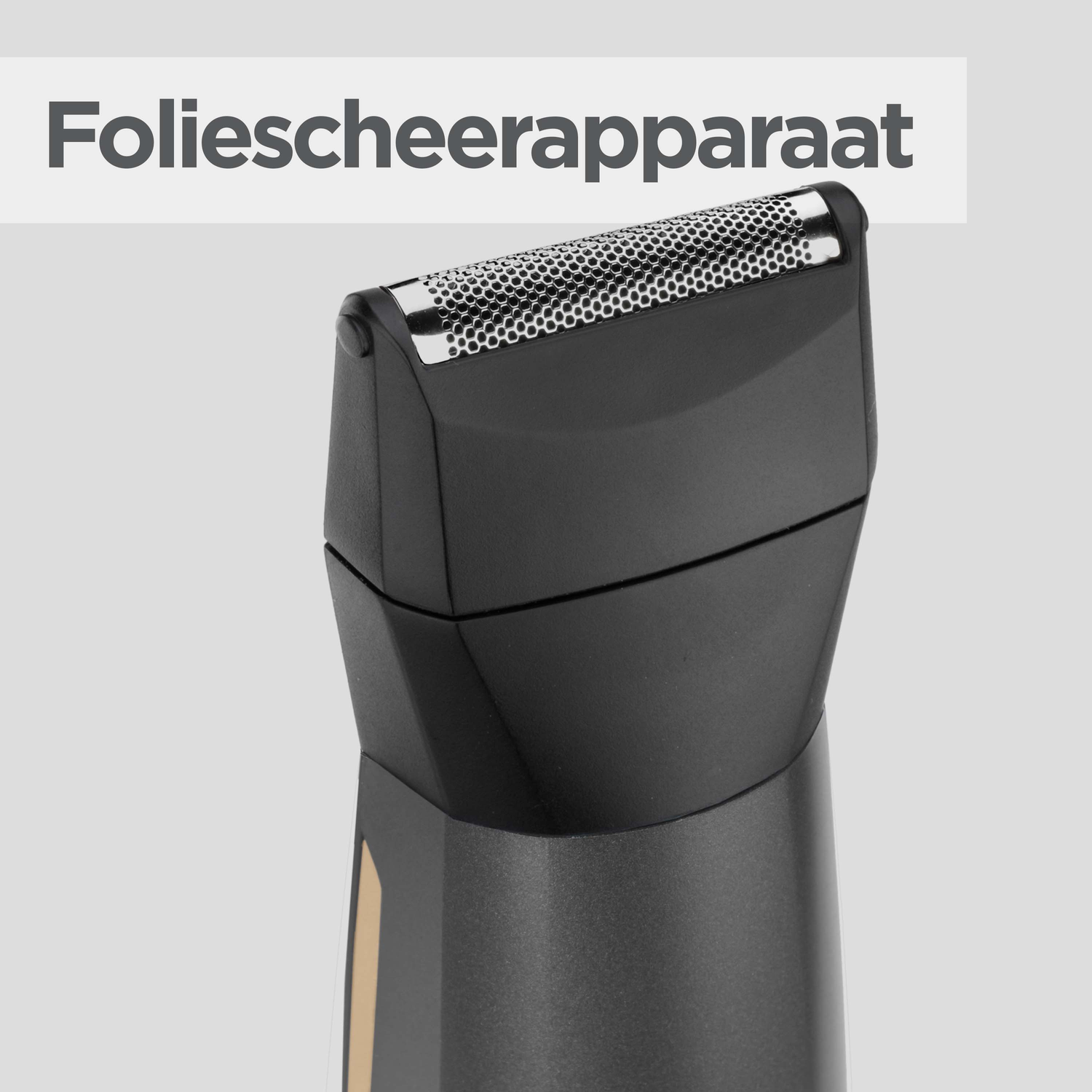 Close-up of a black and silver electric shaver. The text 'Foliescheerapparaat' is at the top.