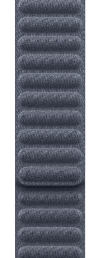 Nahaufnahme eines blau-grauen Uhrenarmbands. Das Band hat einen strukturierten Stoff mit erhabenen, horizontalen, pillenförmigen Abschnitten.
