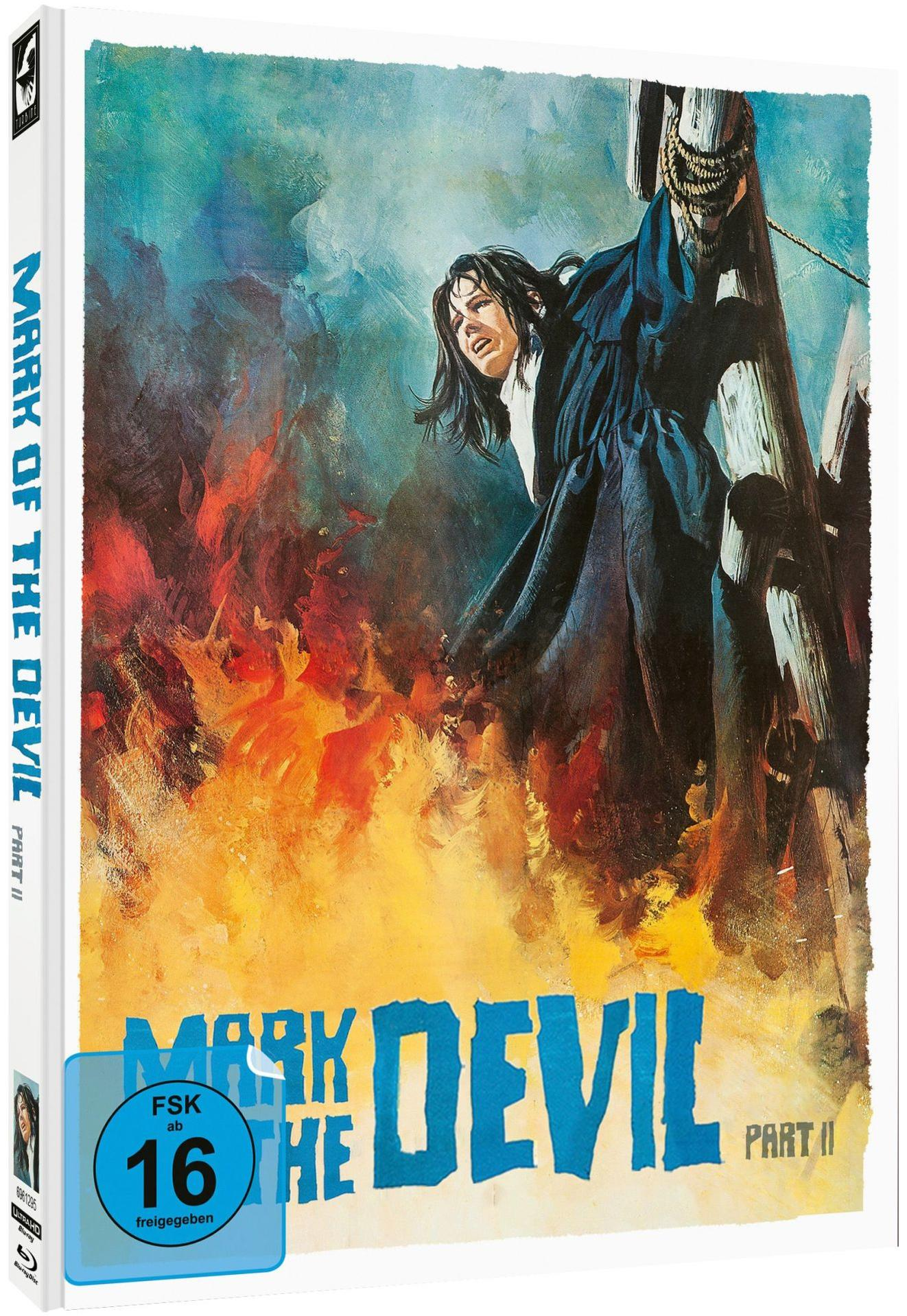 Ein Filmposter zeigt eine Frau, die an einen Pfahl gebunden ist, Flammen im Vordergrund. Der Titel 'Mark of the Devil' ist zu sehen.