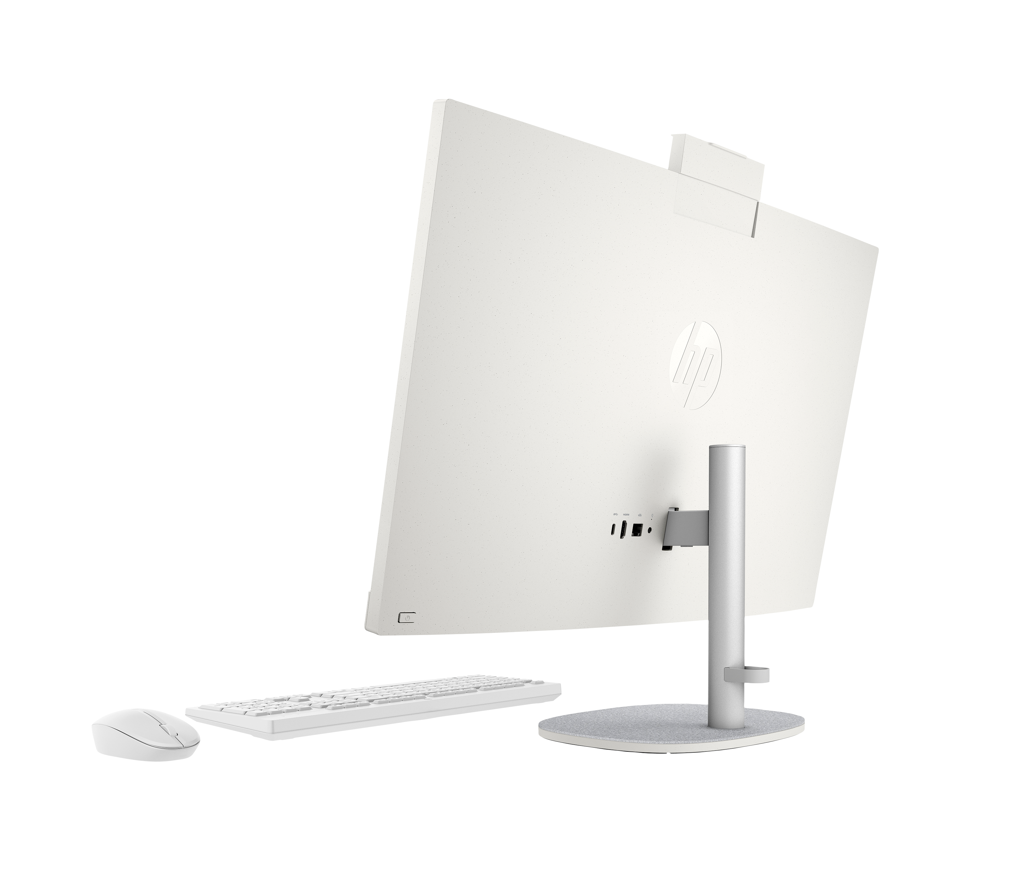 Biały komputer HP typu all-in-one z klawiaturą i myszką na czarnym tle.