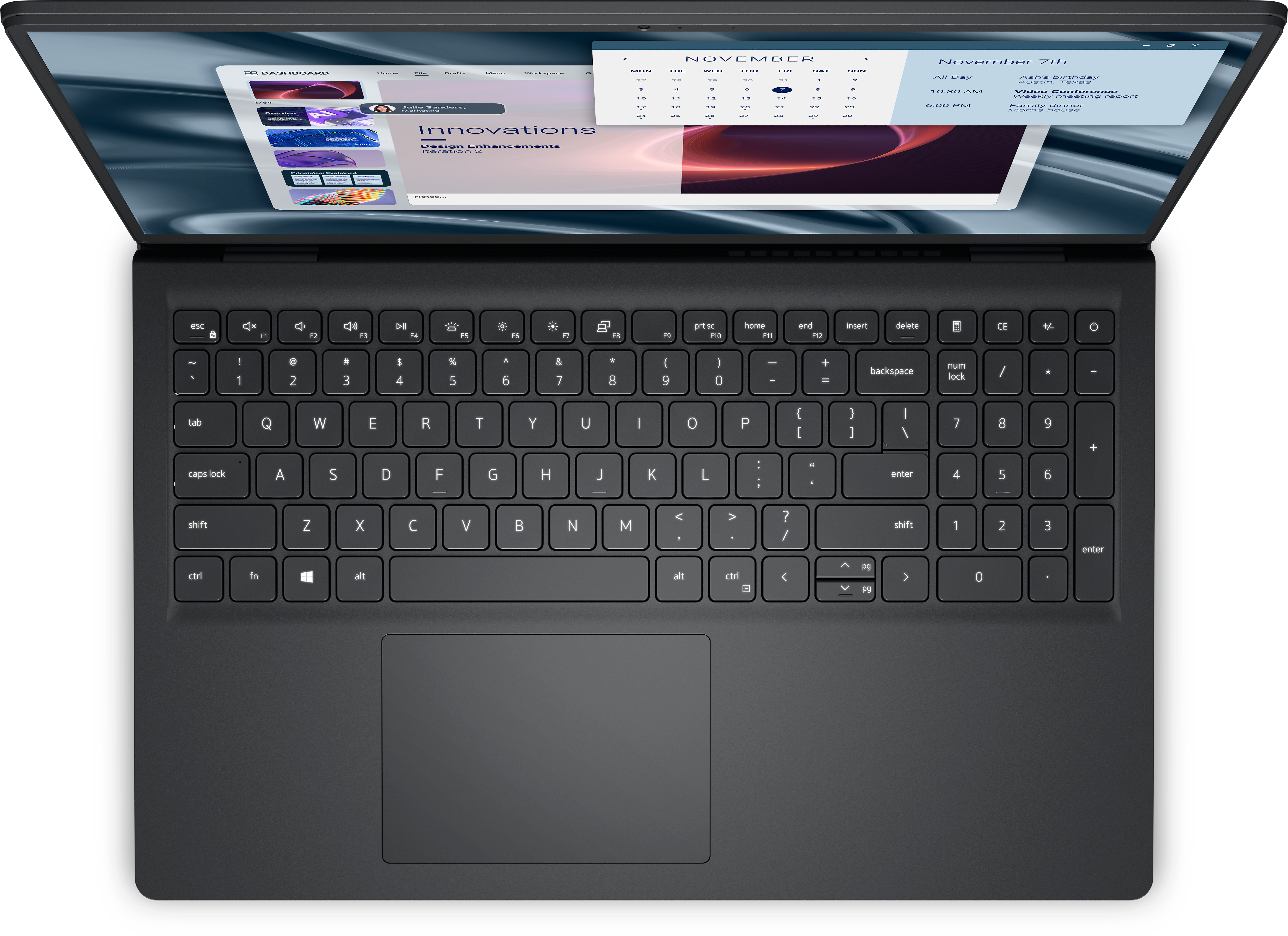 Draufsicht auf einen Laptop. Der Bildschirm zeigt einen Kalender und eine Präsentation. Tastatur und Touchpad sichtbar.