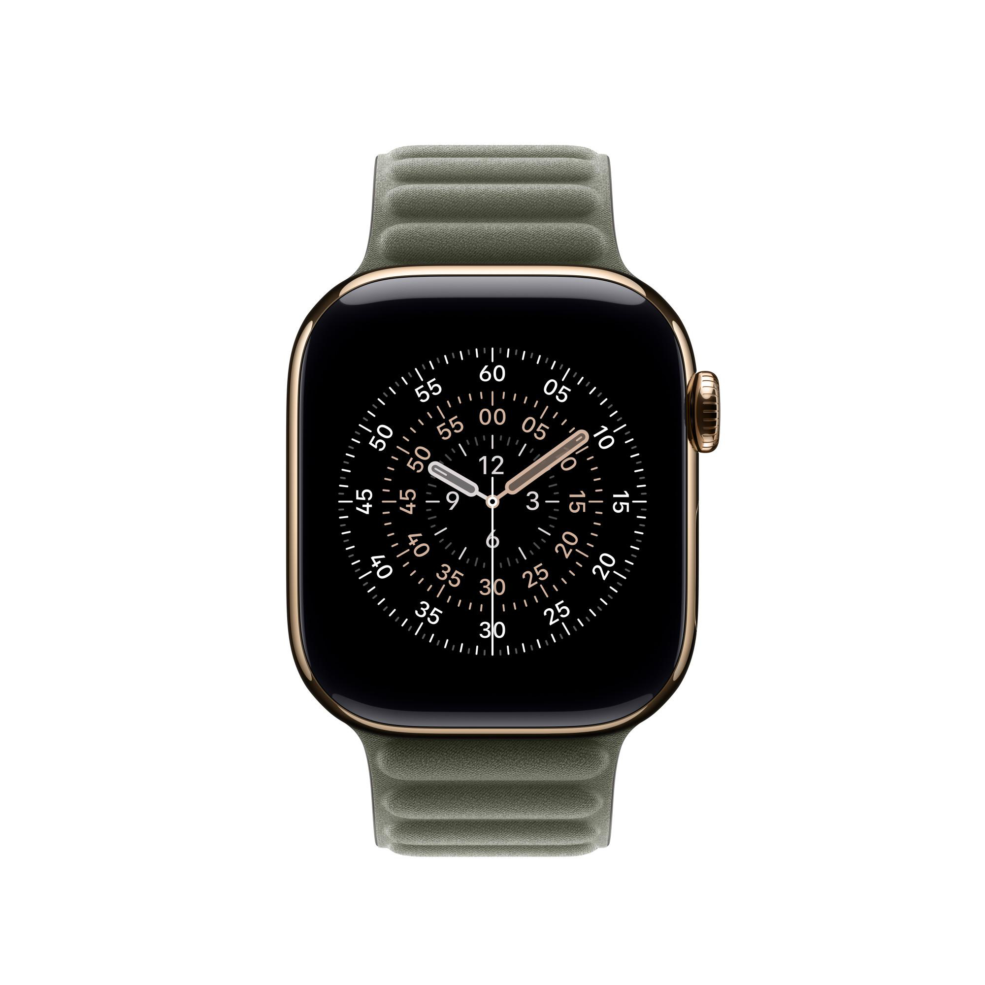 Eine Apple Watch mit schwarzem Zifferblatt, goldenem Rahmen und grünem Band. Die Uhr zeigt 12:09 Uhr.