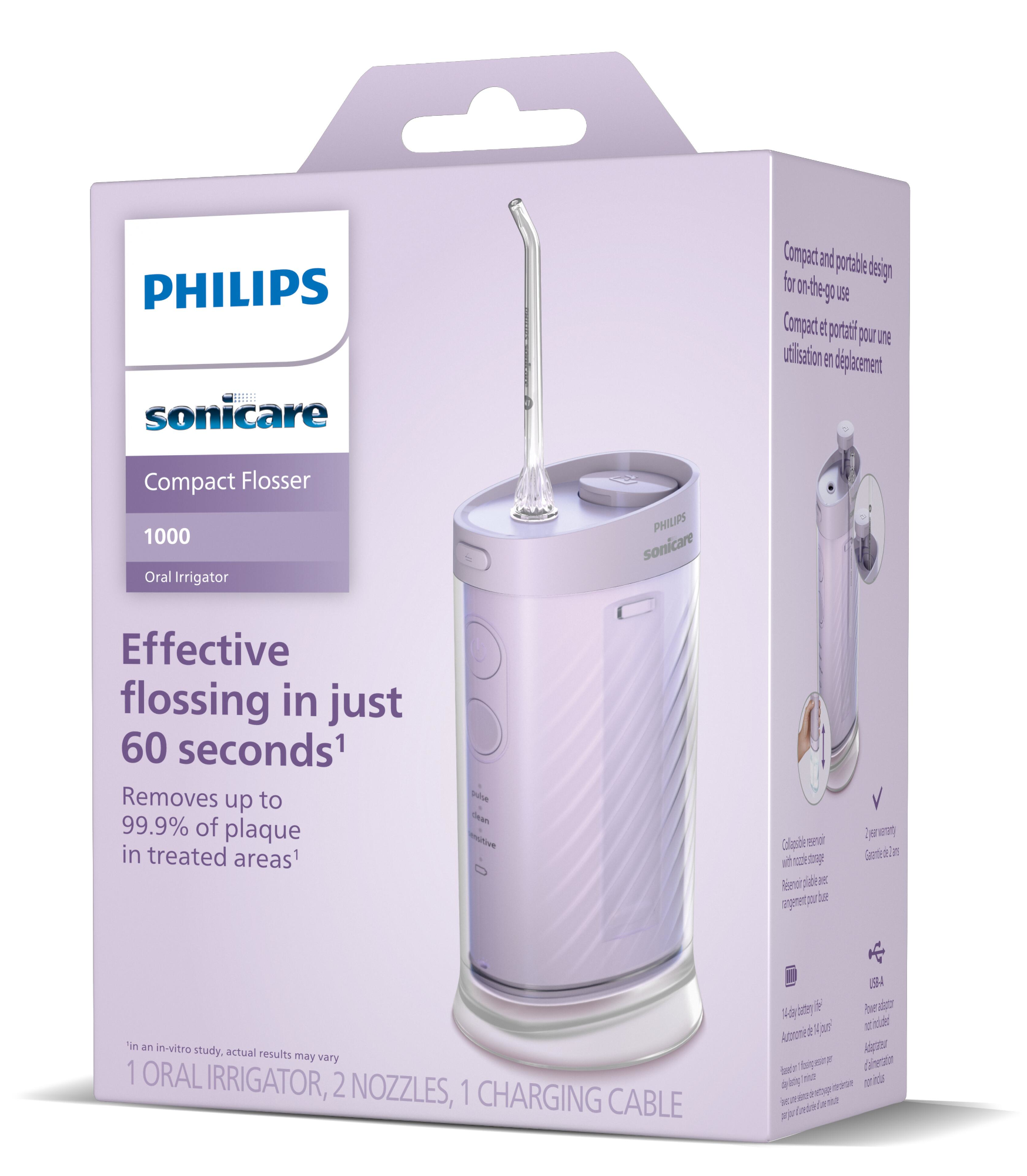 Egy Philips Sonicare Compact Flosser doboz. A doboz fehér és lila, benne egy fogtisztítóval. A szöveg tartalmazza az 'Oral Irrigator' kifejezést.